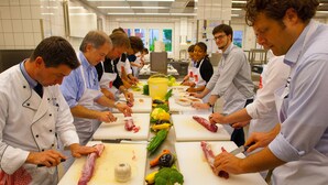 A group of chefs preparing food in a professional kitchen. - Best Western Premier IB Hotel Friedberger Warte (Frankfurt)