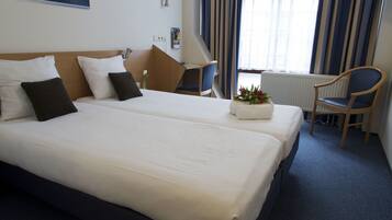Een strijkplank/strijkijzer, babybedden, gratis wifi