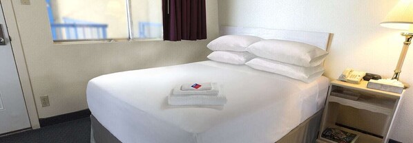 Blackout drapes, iron/ironing board, free WiFi, bed sheets