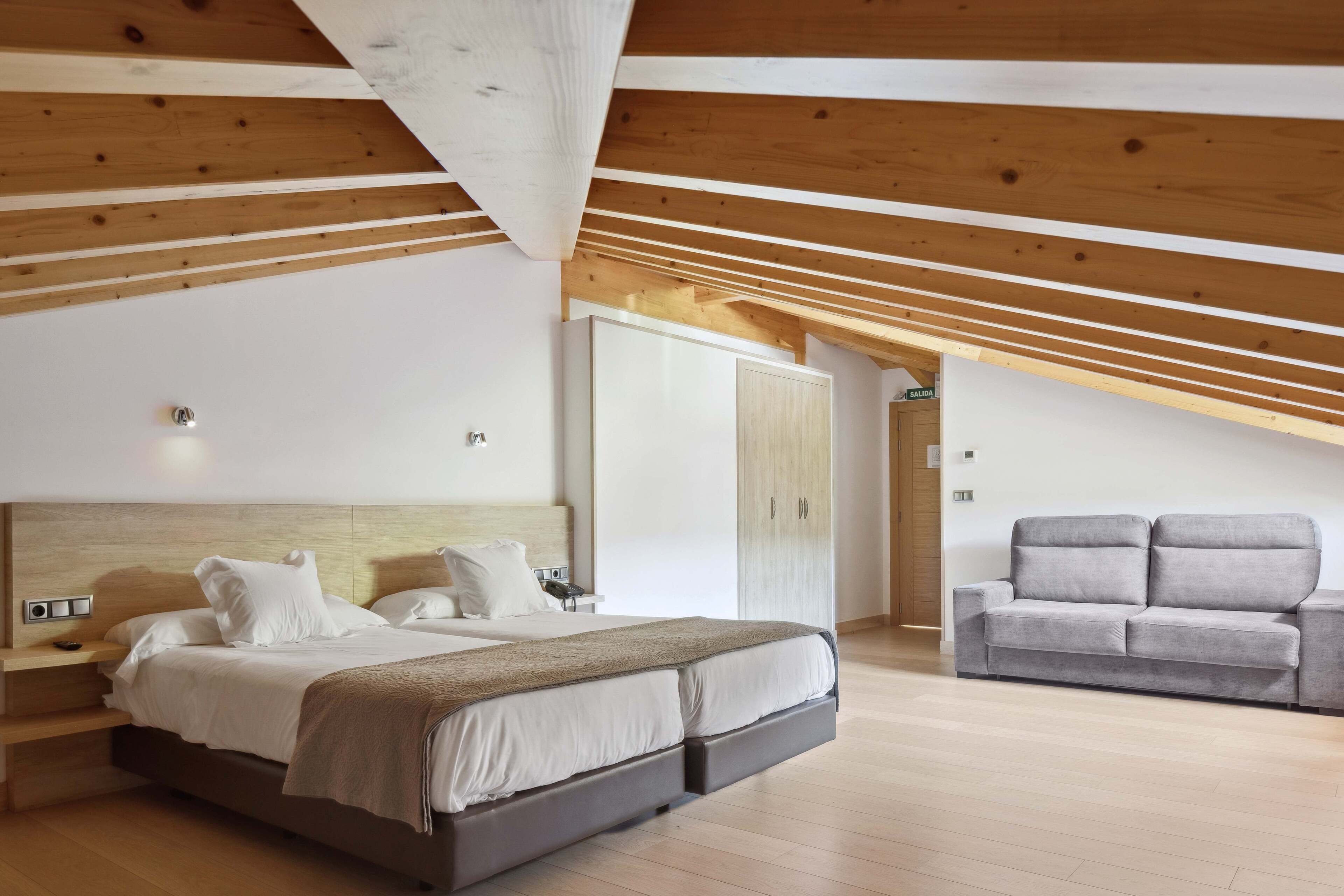 family room | 1 bedroom, down duvets, in-room safe, desk