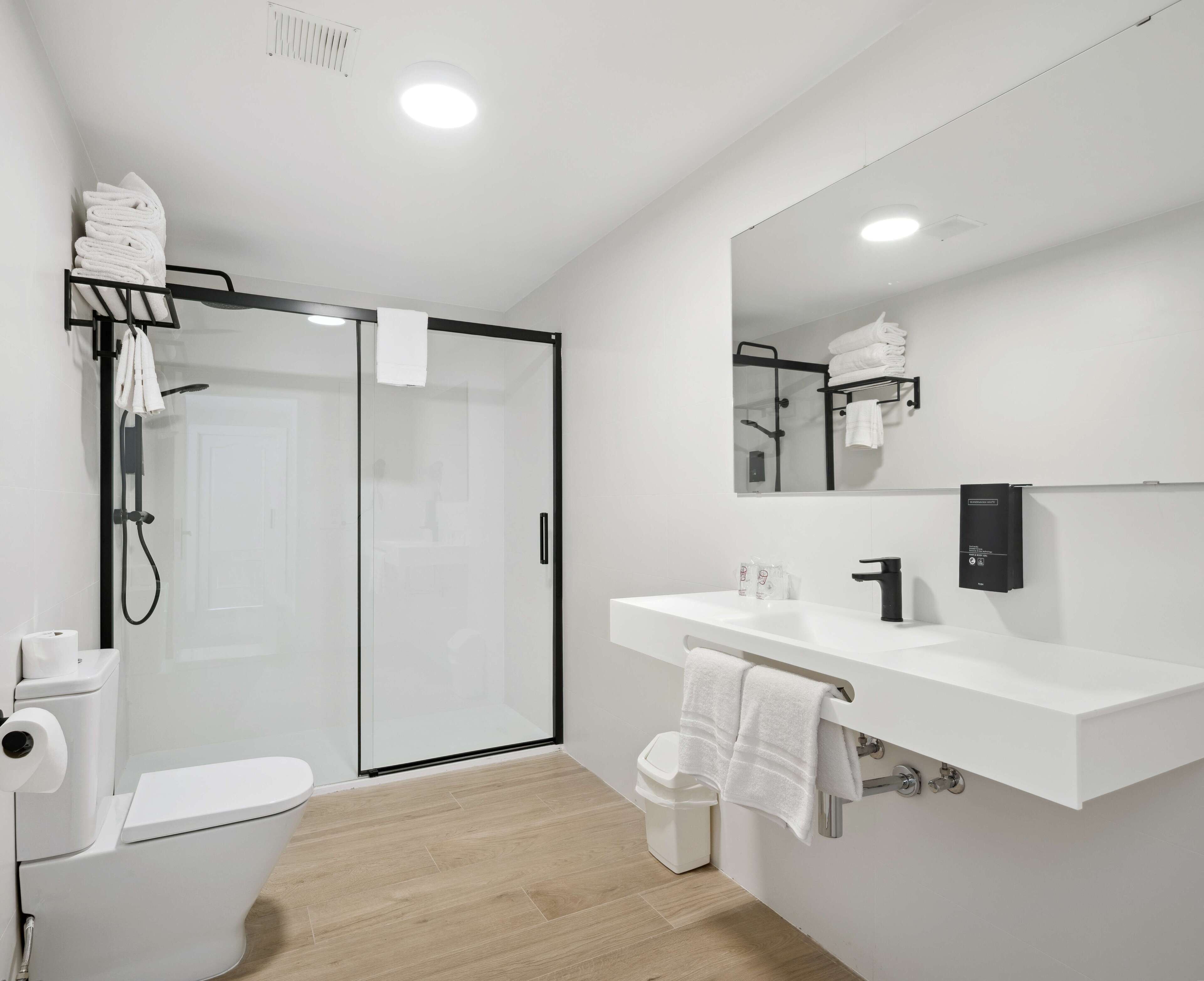 superior room | bathroom | hair dryer, towels