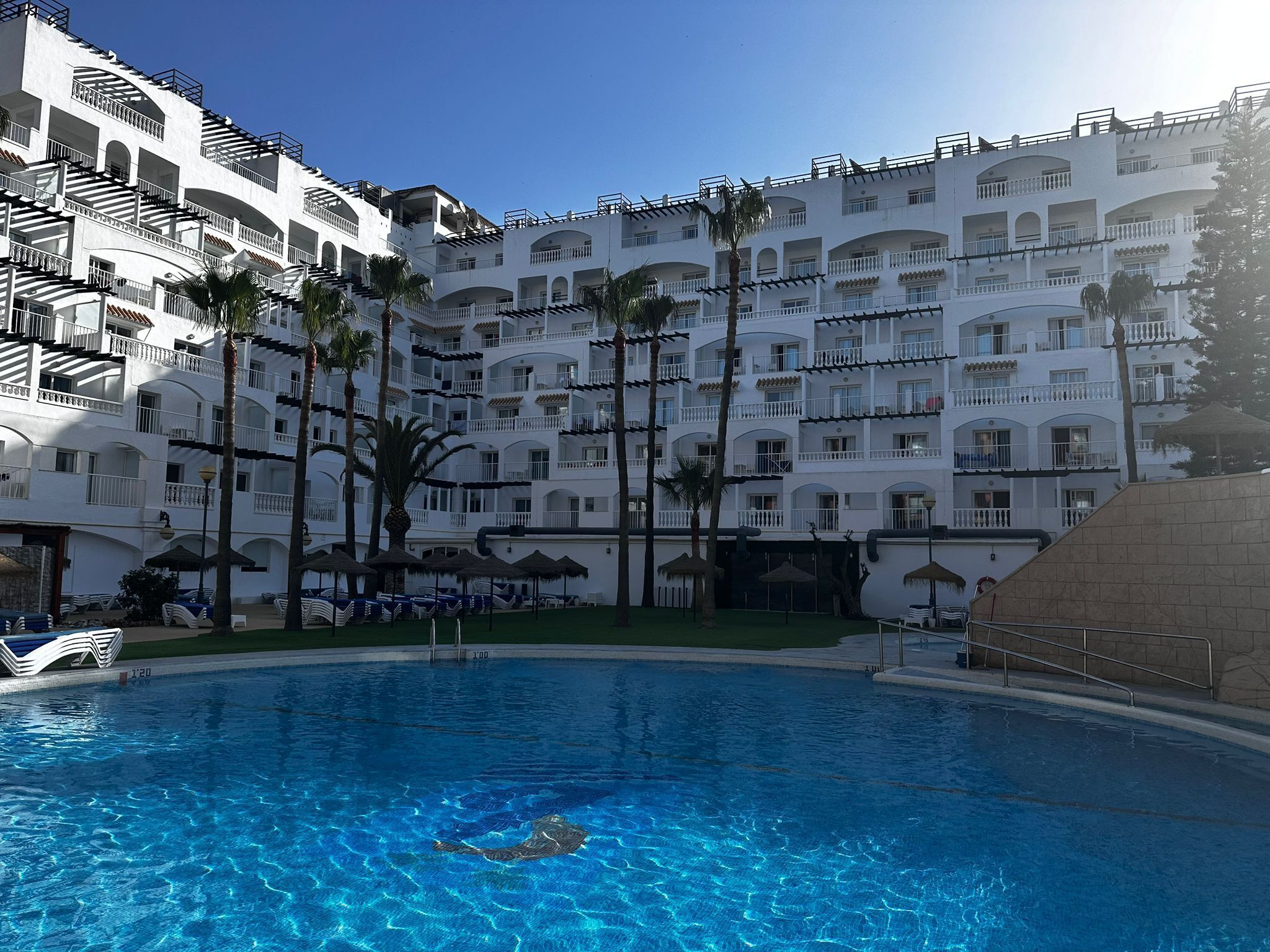 indoor pool, 2 outdoor pools, open 10 am to 8:00 pm, pool umbrellas