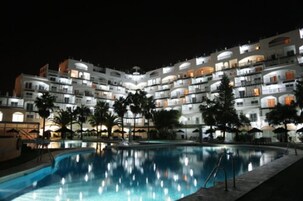 Indoor pool, 2 outdoor pools, open 10 AM to 8:00 PM, pool umbrellas