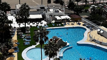 Indoor pool, 2 outdoor pools, open 10 AM to 8:00 PM, pool umbrellas