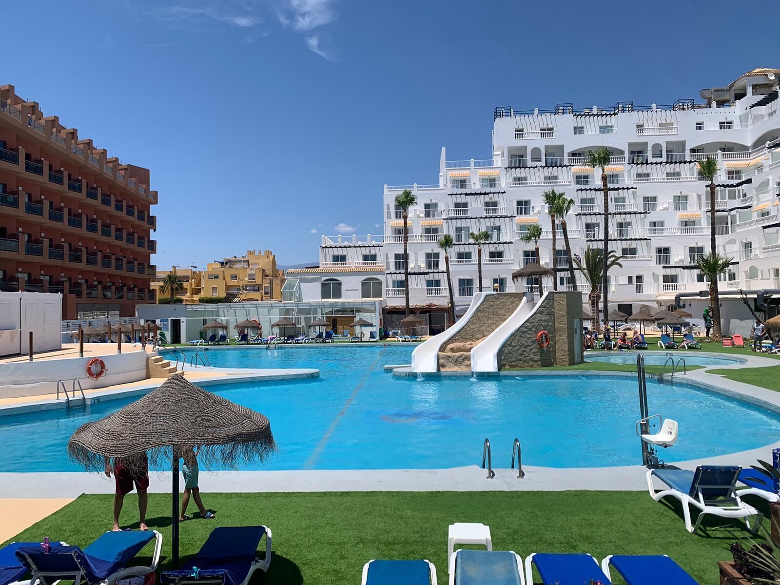 indoor pool, 2 outdoor pools, open 10 am to 8:00 pm, pool umbrellas