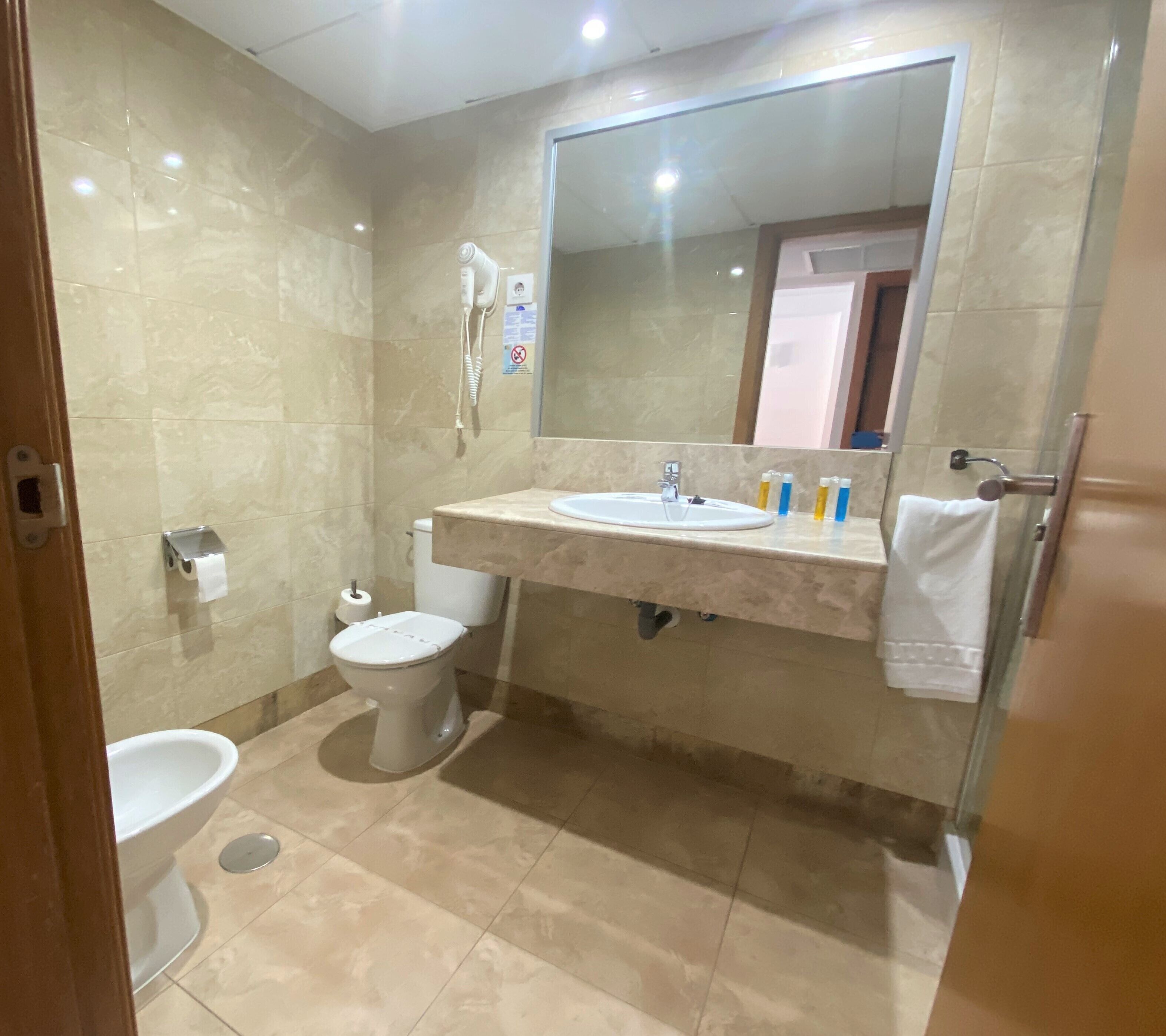 free toiletries, hair dryer, towels, soap