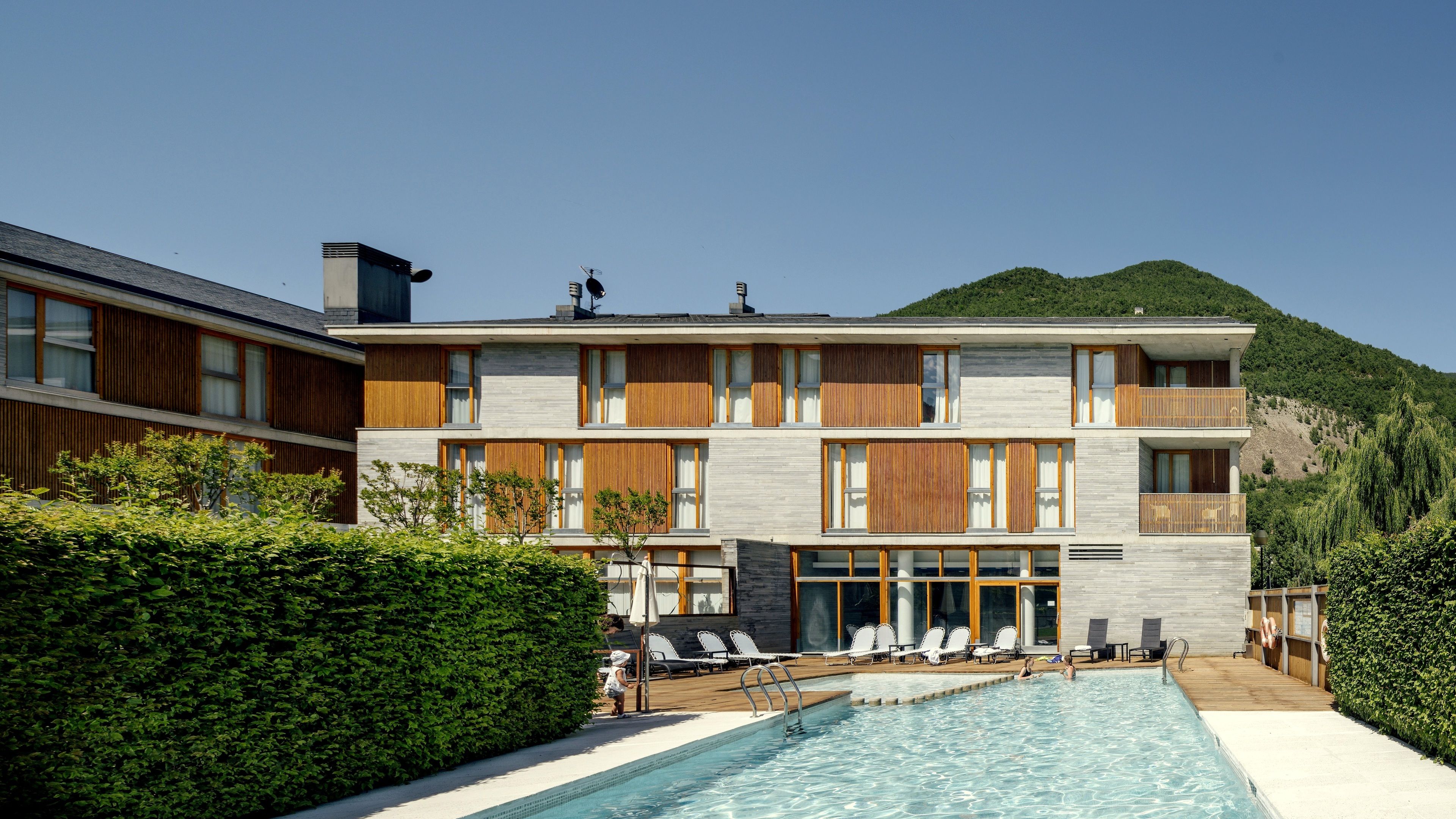 indoor pool, outdoor pool, pool loungers