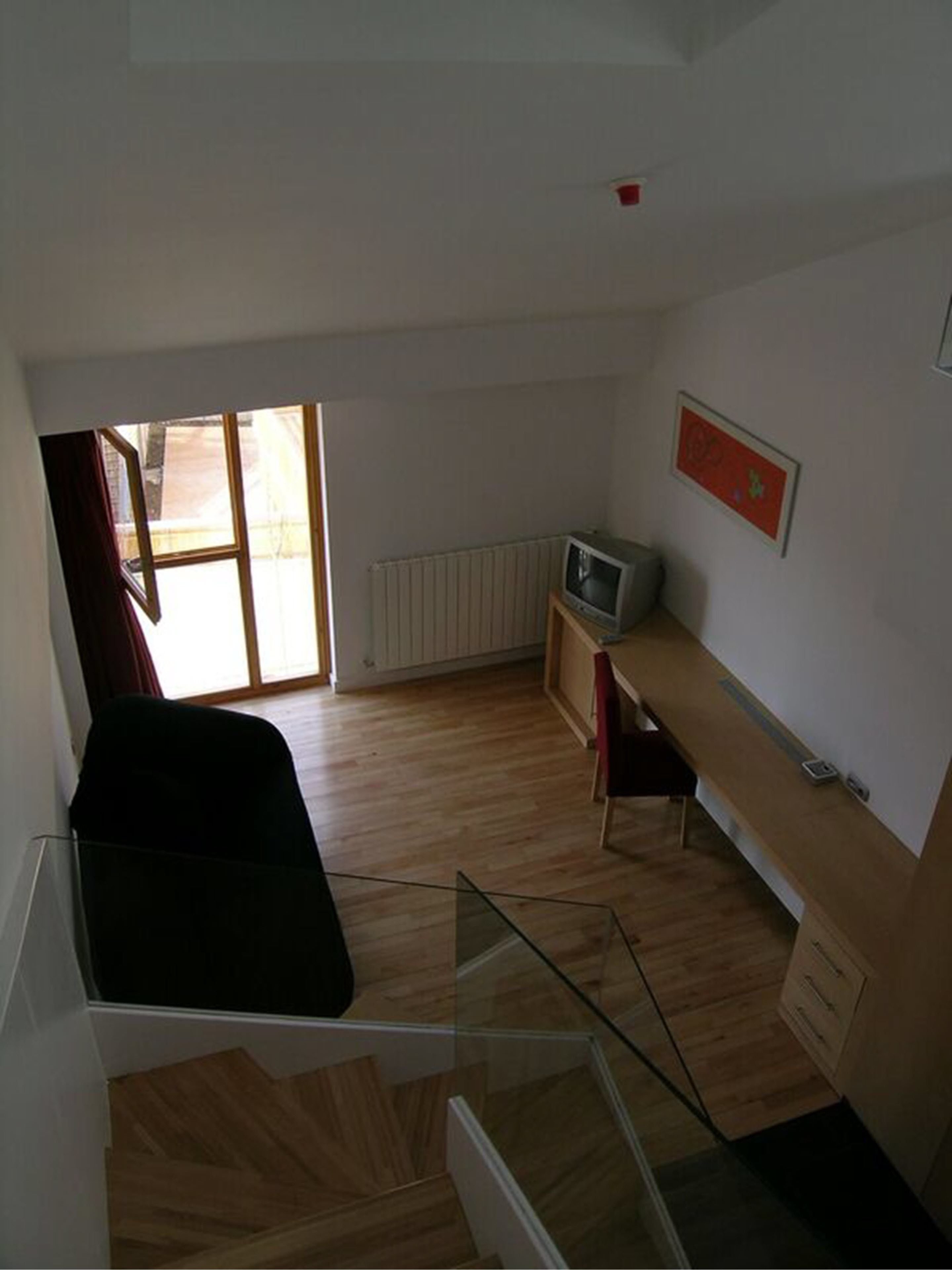 suite, jetted tub (duplex) | living room | tv