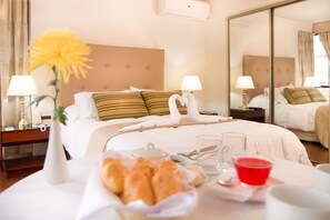 Standard Double Room | Minibar, in-room safe, desk, iron/ironing board