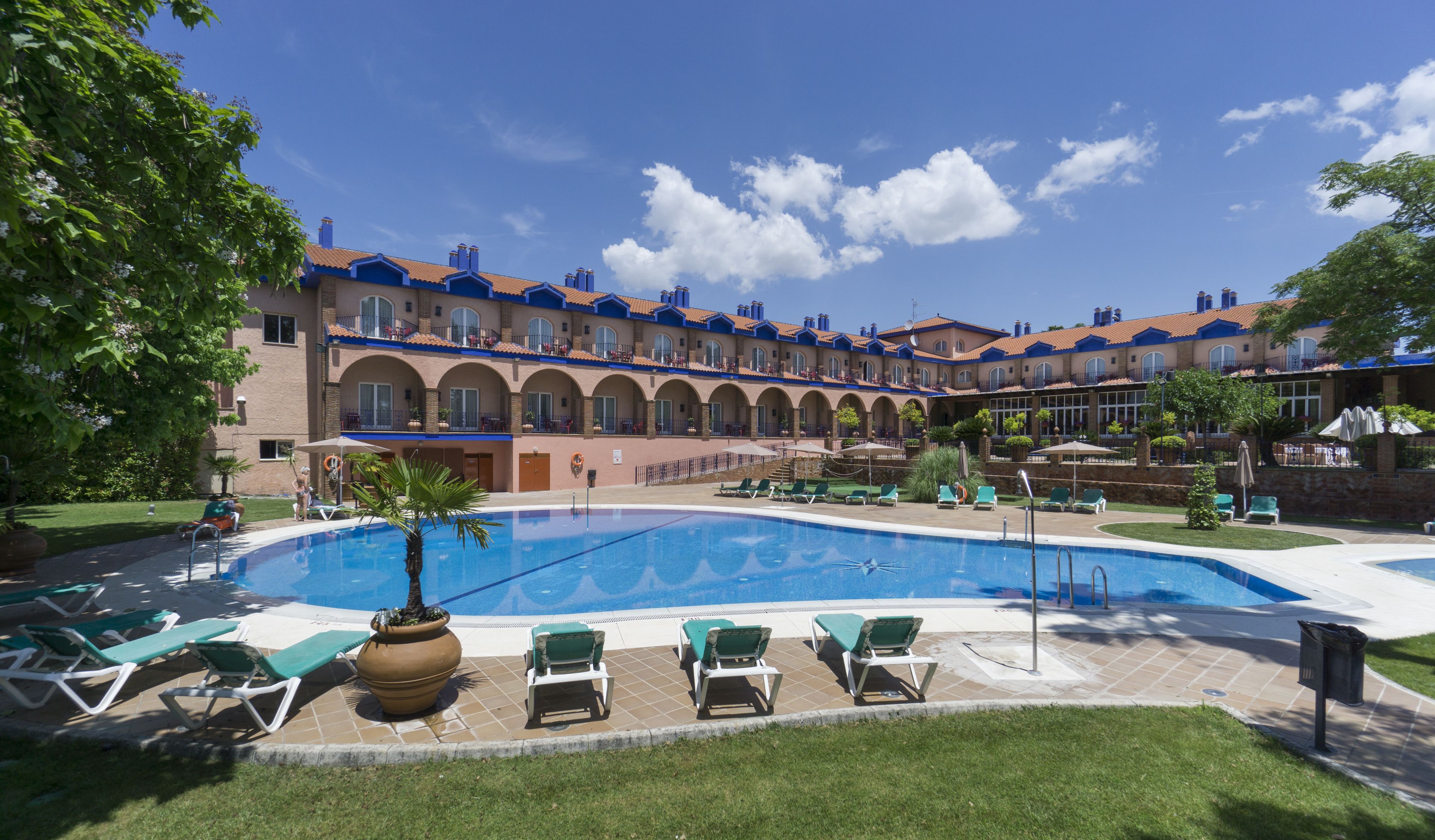 seasonal outdoor pool, pool umbrellas, pool loungers