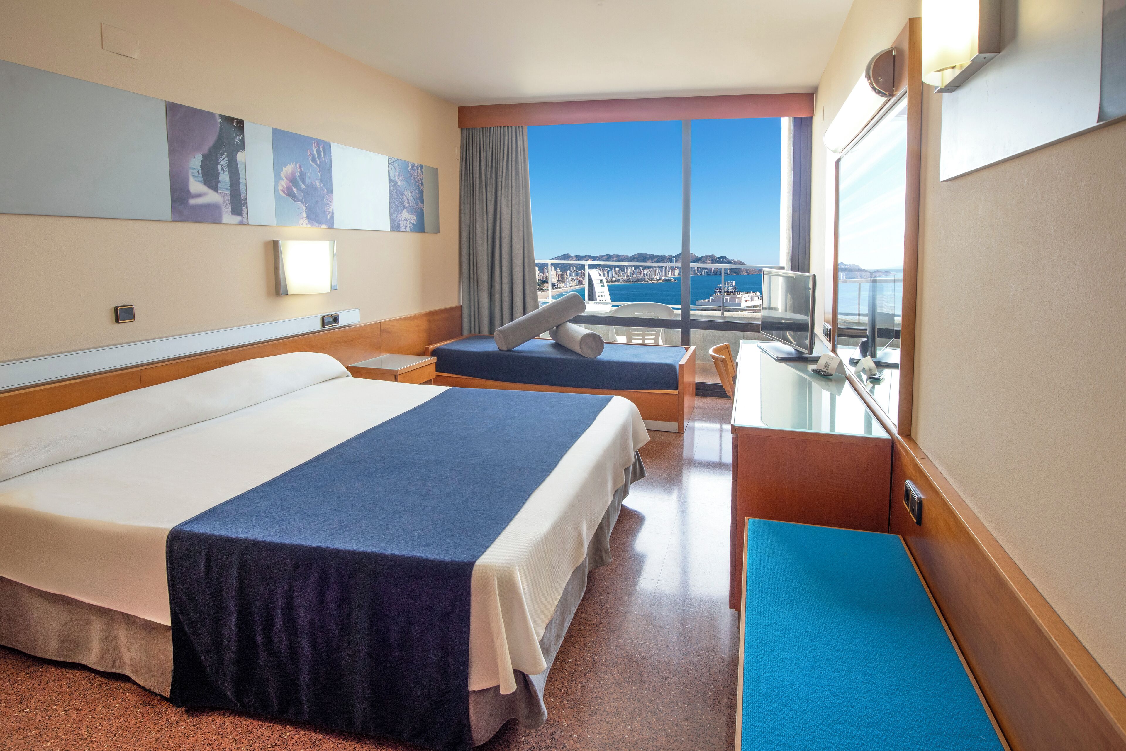 Desk, blackout drapes, WiFi (surcharge), bed sheets