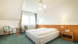 Ropa de cama de alta calidad y minibar 