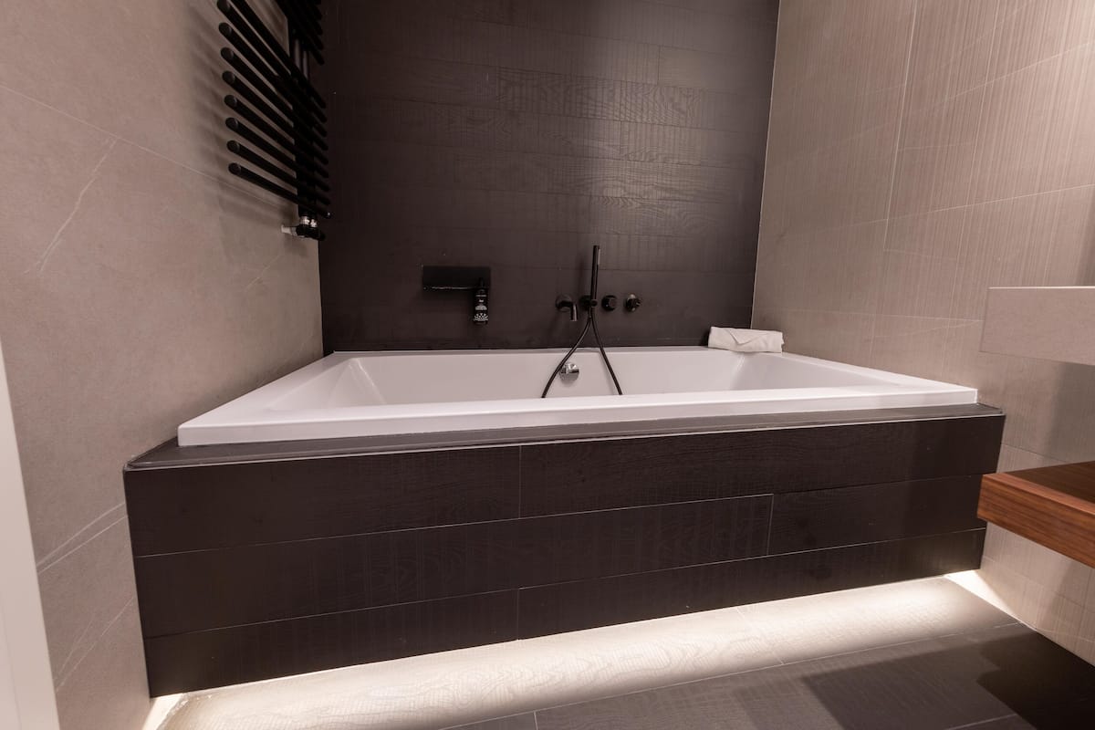 separate bathtub and shower, deep-soaking bathtub, free toiletries