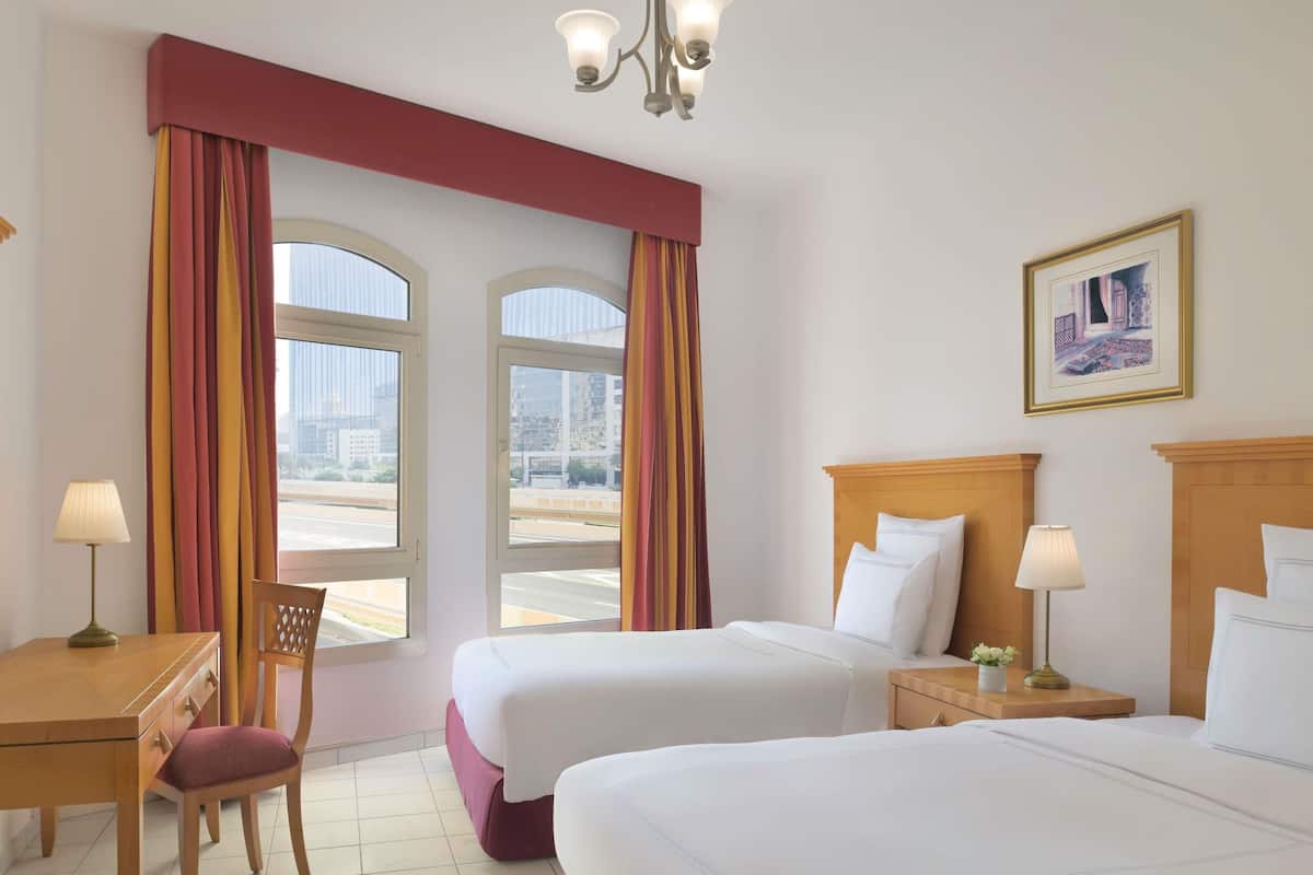 Departamento, 2 habitaciones | Minibar, caja de seguridad en la habitación y muebles diferentes