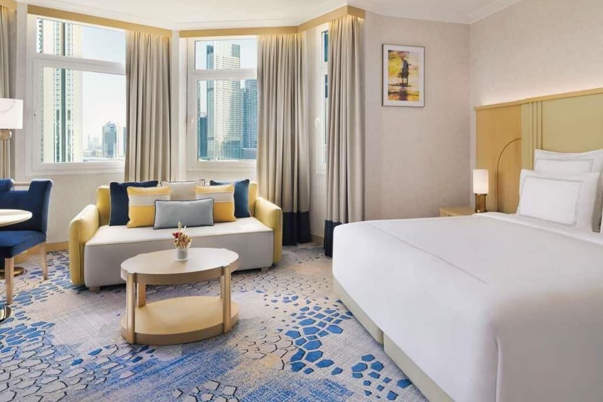 Suíte clássica, 1 cama King | Frigobar, cofres nos quartos, individualmente mobiliados, escrivaninha