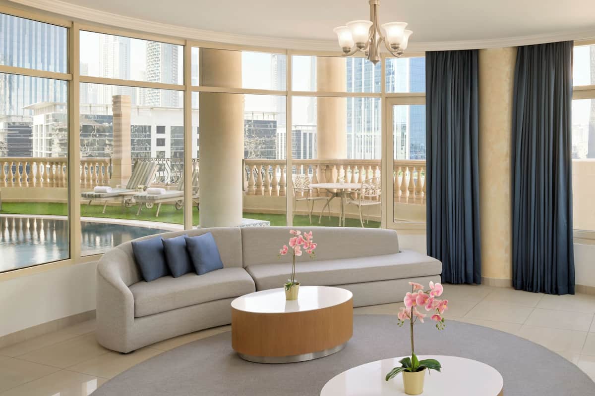 Penthouse, Multiple Beds | Living room | TV