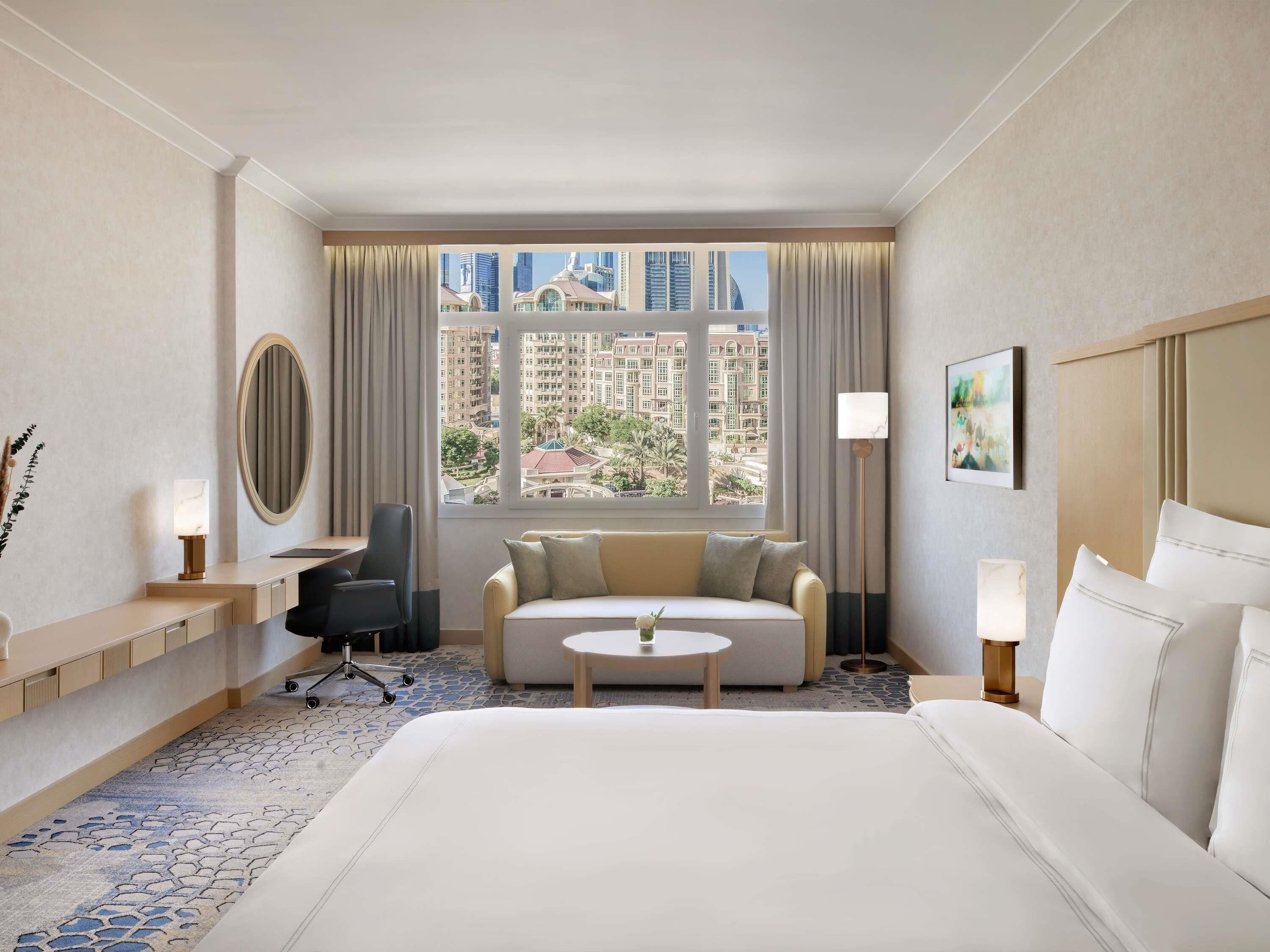 Deluxe Room, 1 King Bed | Minibar, in-room safe, individually furnished, desk