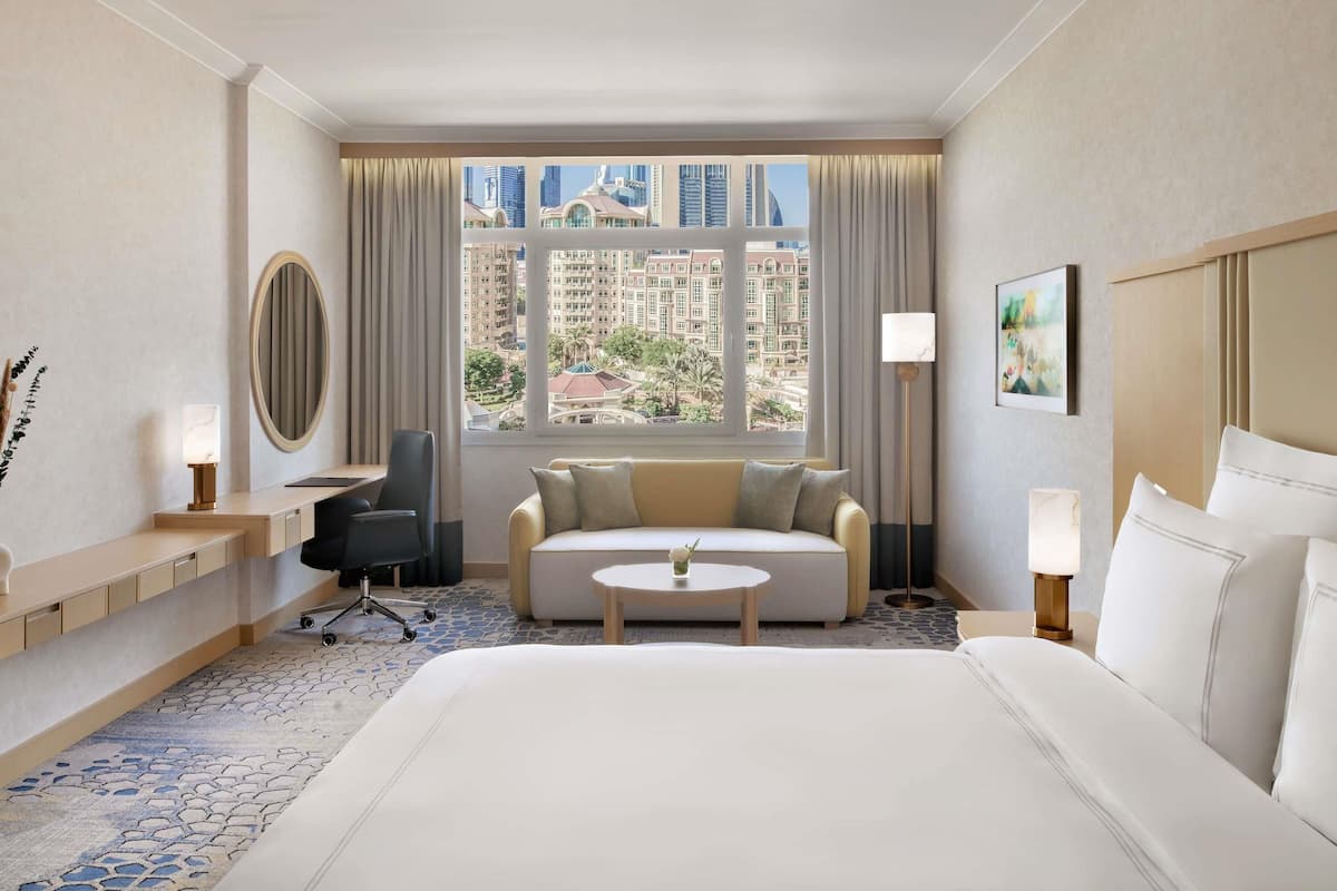 Deluxe Room, 1 King Bed | Minibar, in-room safe, individually furnished, desk