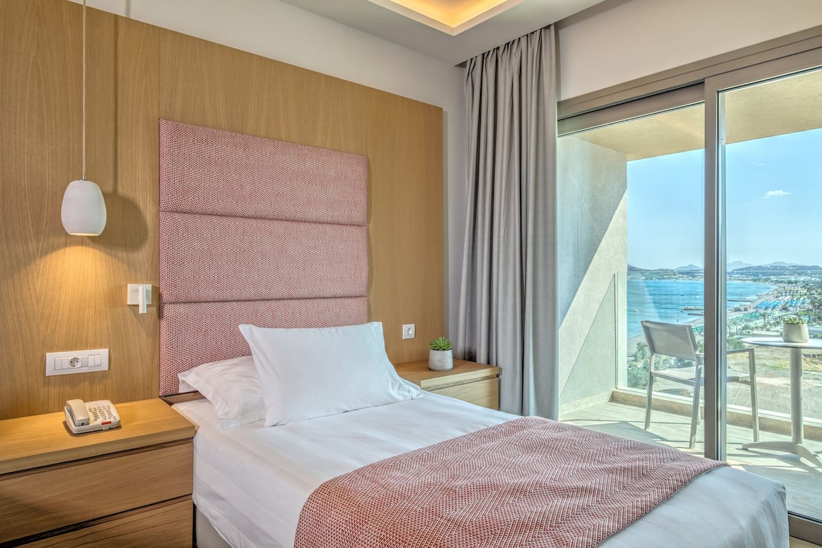 Triple Room Side Sea View | 1 bedroom, in-room safe, blackout drapes, free WiFi