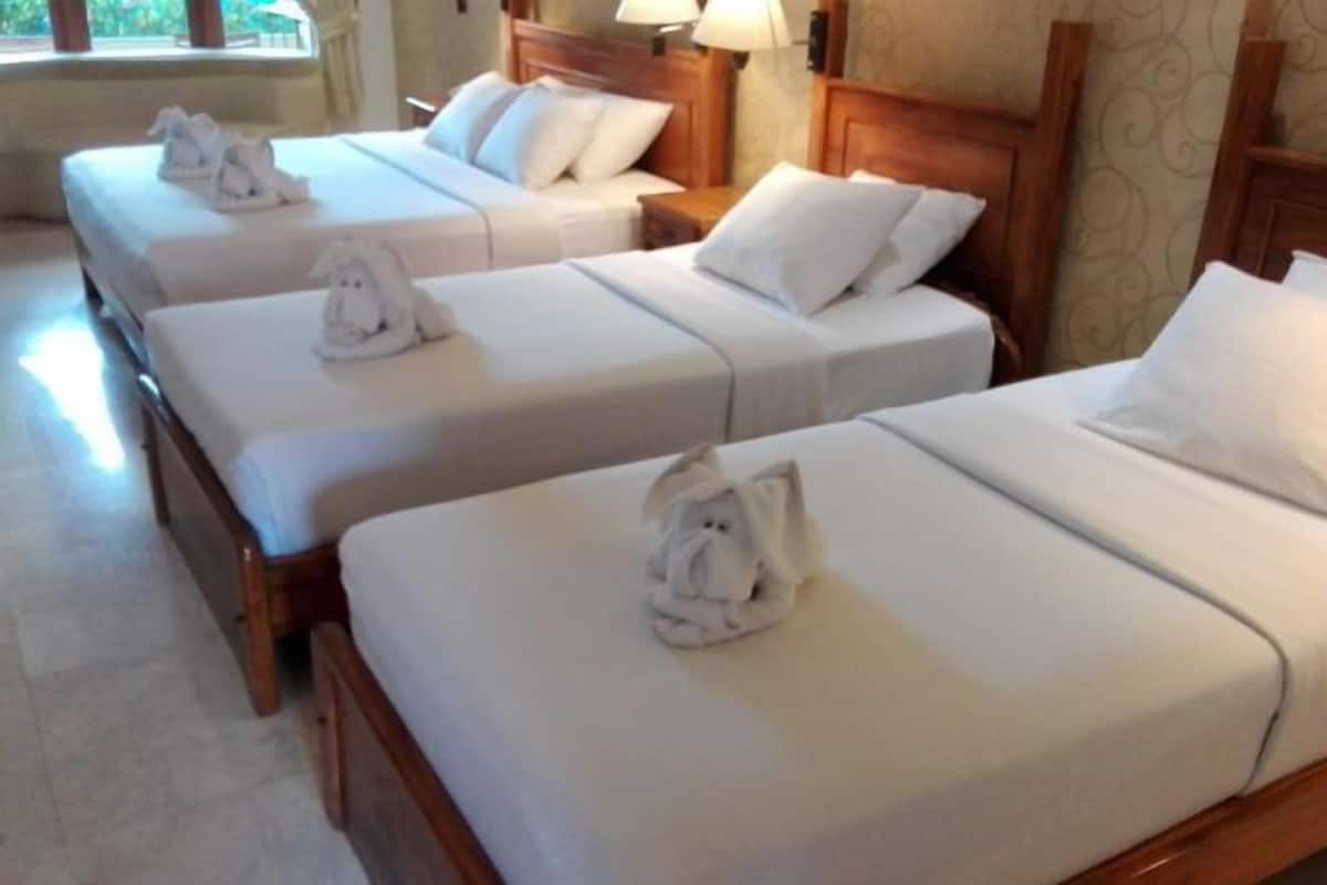 Camas com colchões de espuma com sistema de memória, cofres nos quartos