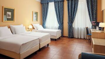 Triple Room | Premium bedding, minibar, in-room safe, desk