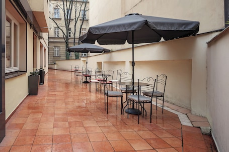 Terrace/patio. Hotel Caesar Prague
