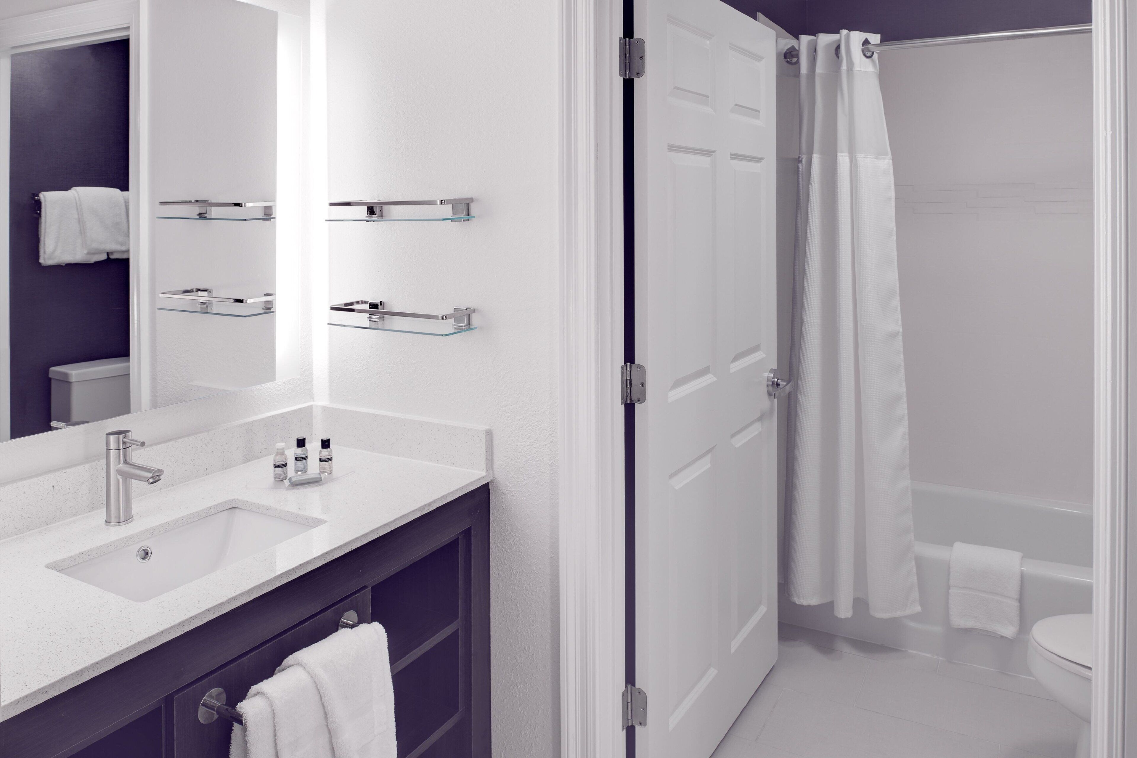 combined shower/bathtub, free toiletries, hair dryer, towels