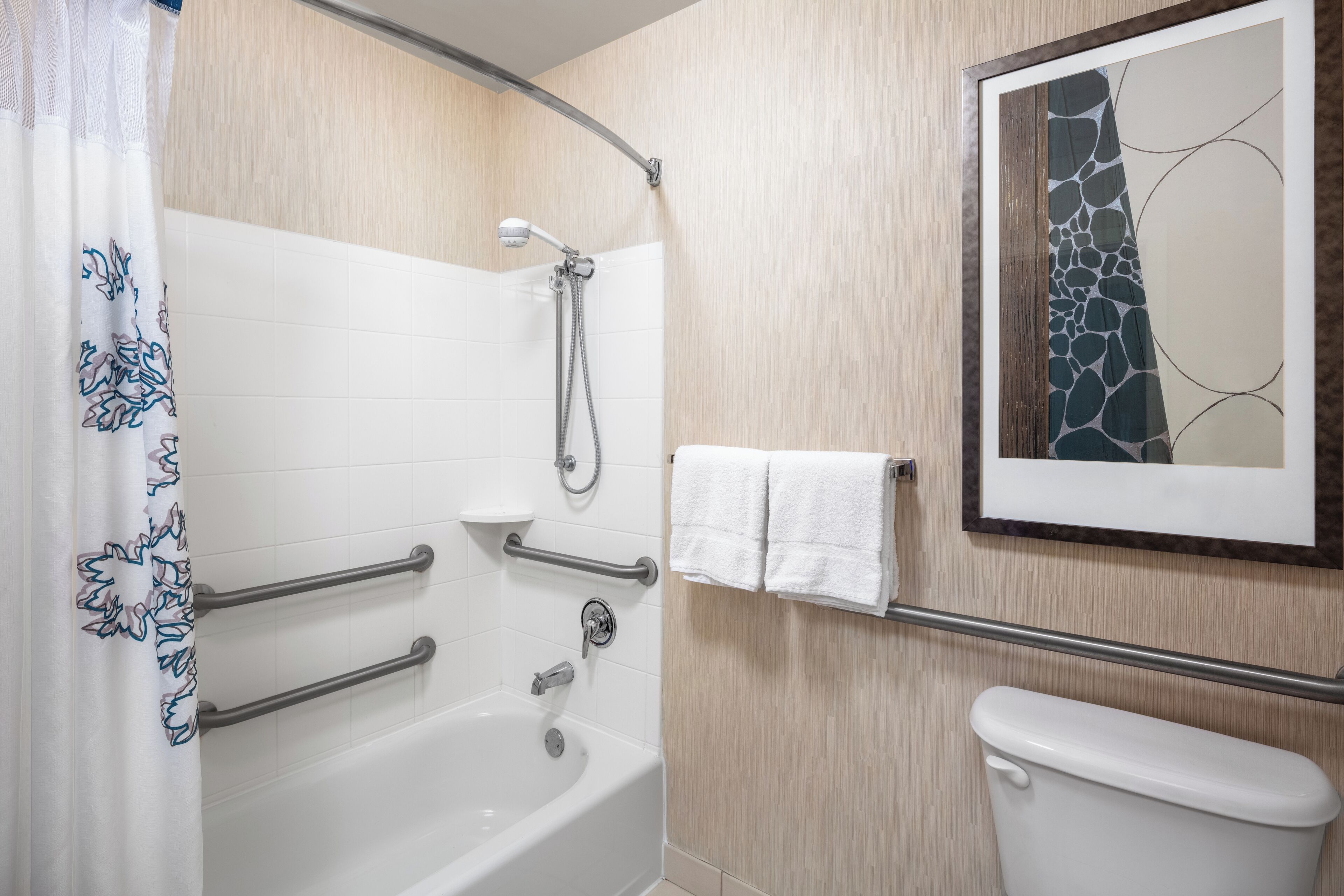 combined shower/bathtub, free toiletries, hair dryer, towels