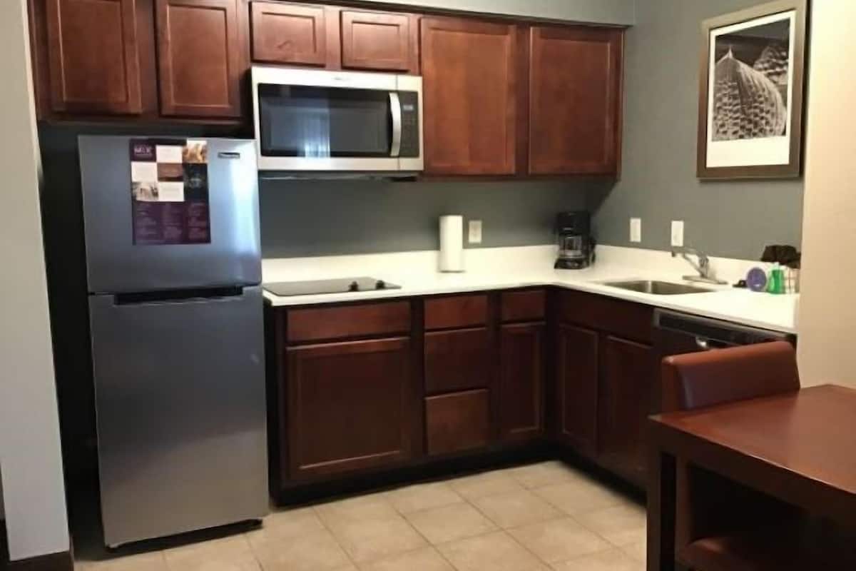 full-sized fridge, microwave, dishwasher, coffee/tea maker