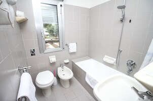 Hair dryer, bidet, towels