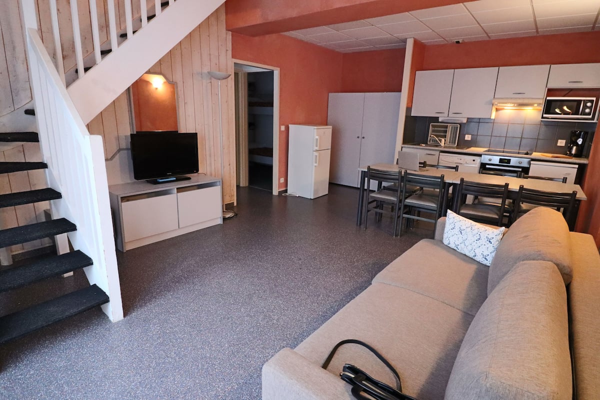 Apartment for 10 people | Living room | Flat-screen TV, foosball