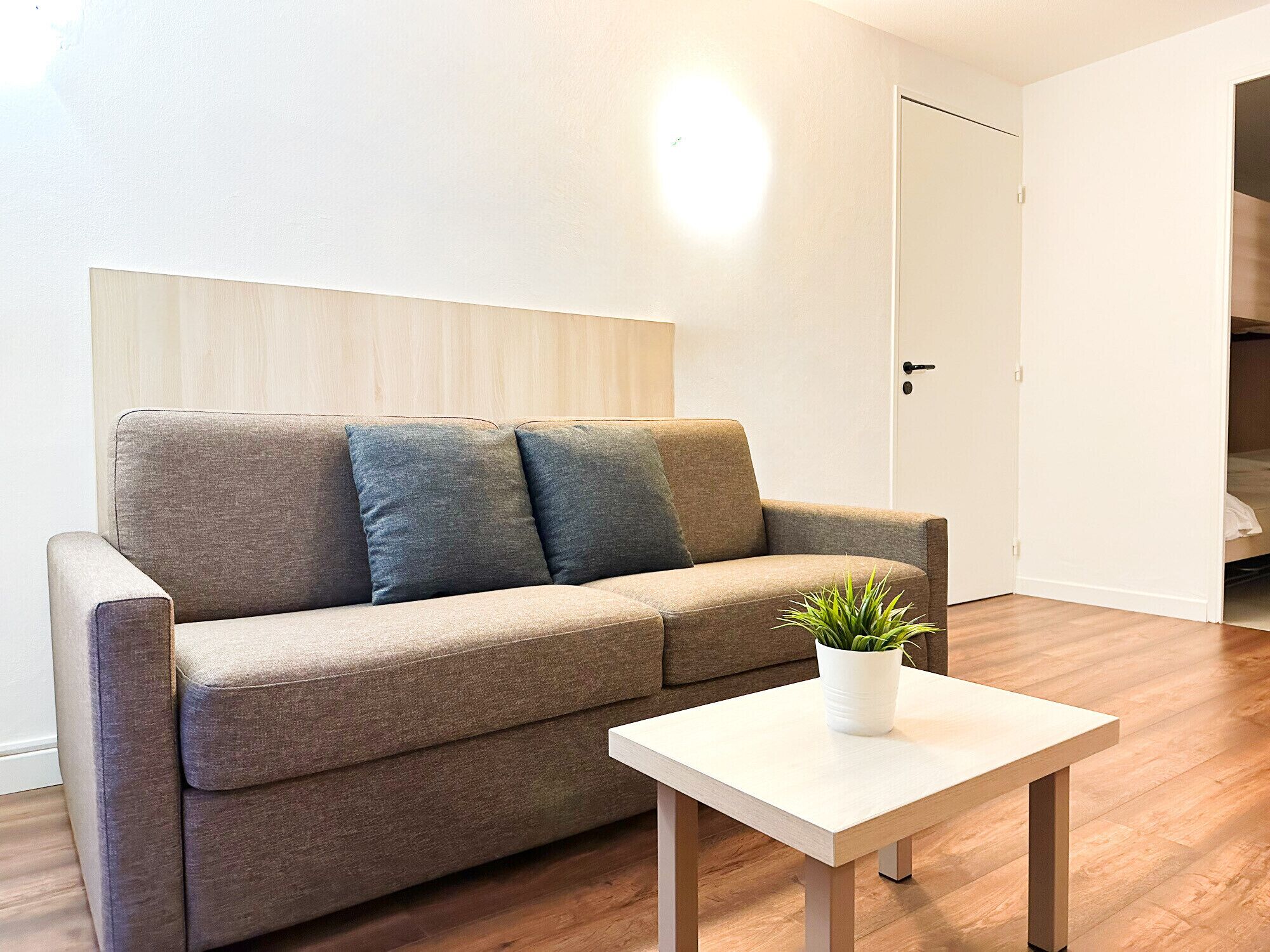 Apartamento | Zona de estar | Una televisión de pantalla plana, un futbolín