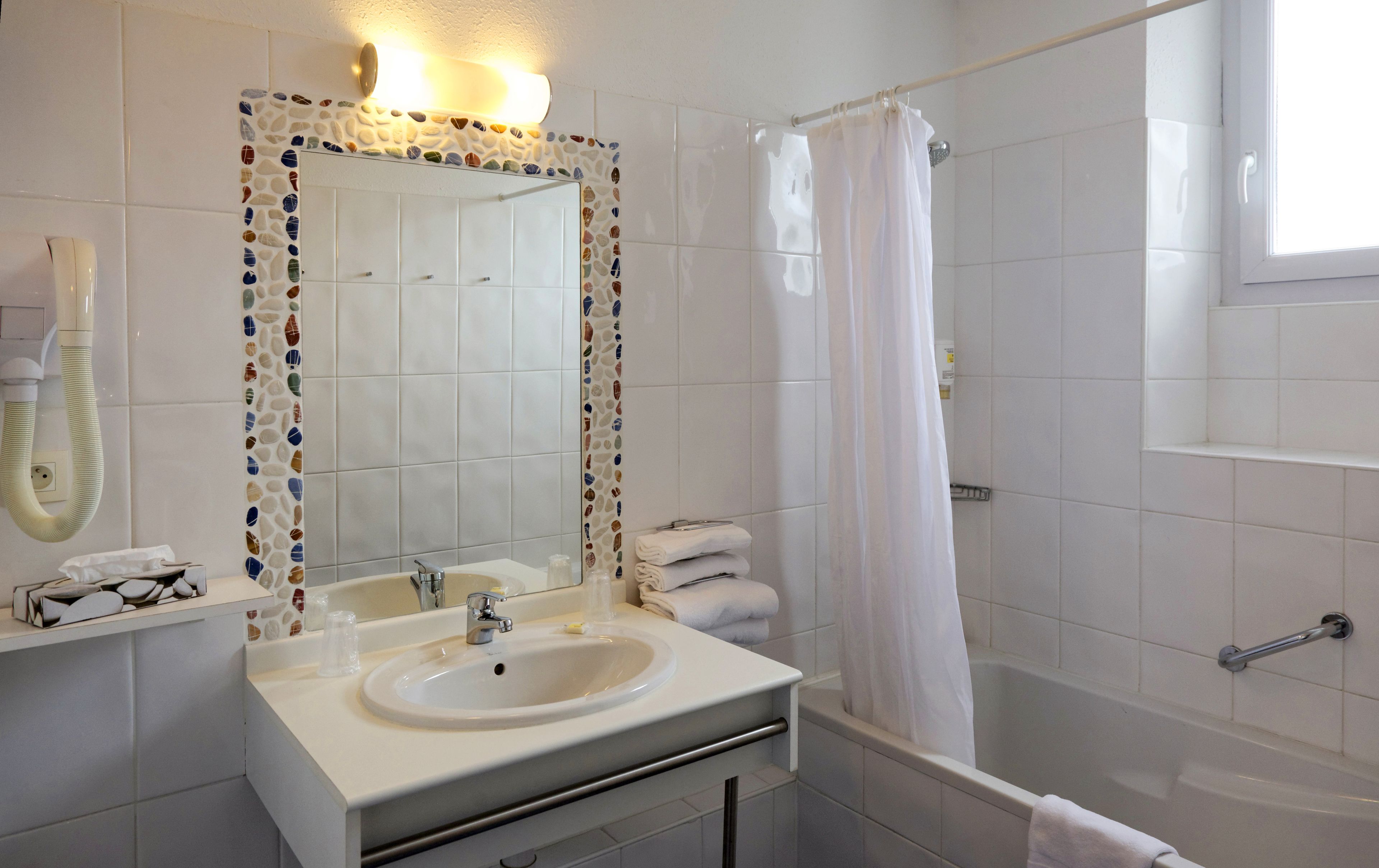 standard quadruple room, garden view | bathroom amenities | free toiletries, hair dryer, towels