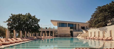 Seasonal outdoor pool, pool umbrellas, pool loungers