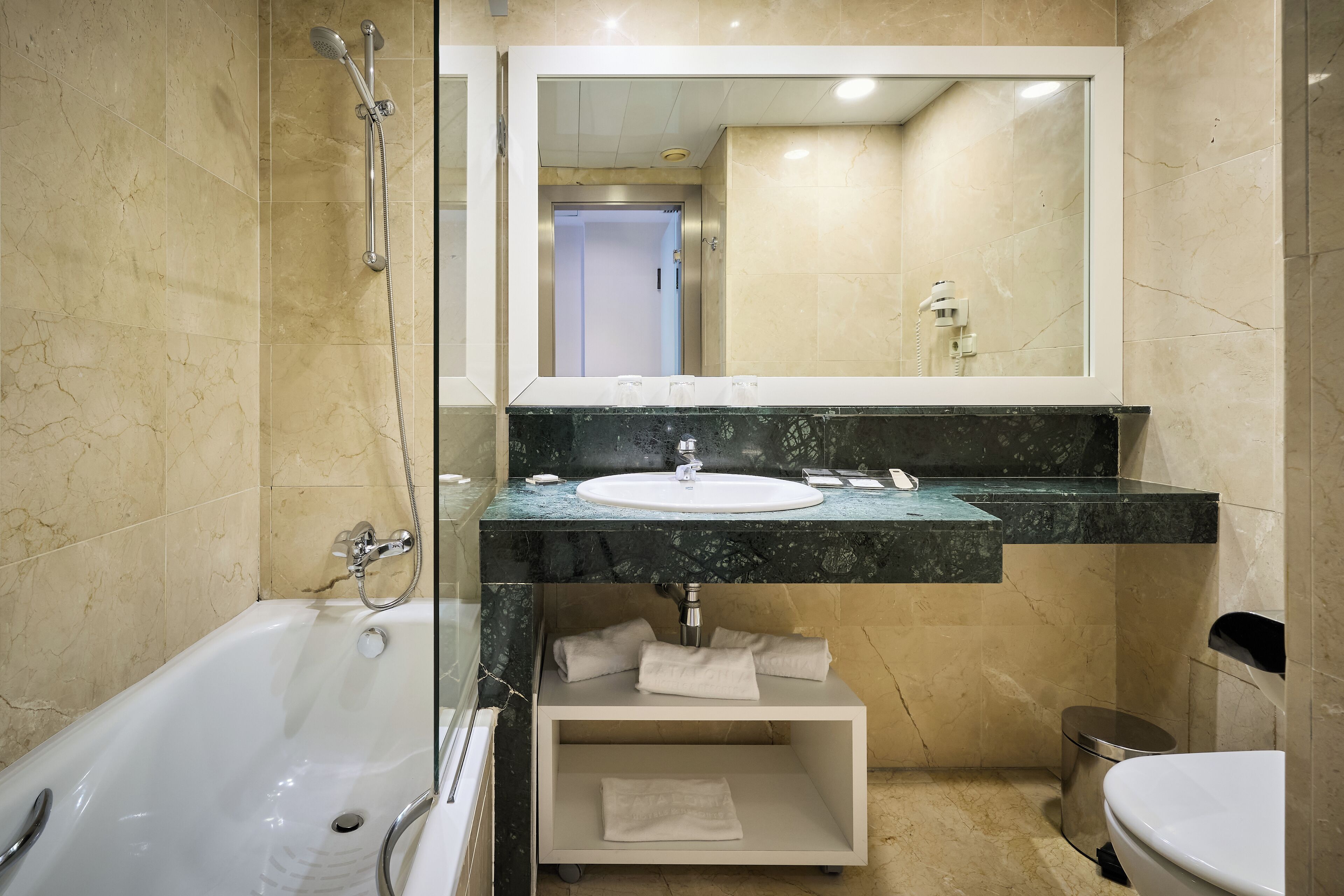 family room | bathroom | eco-friendly toiletries, hair dryer, towels