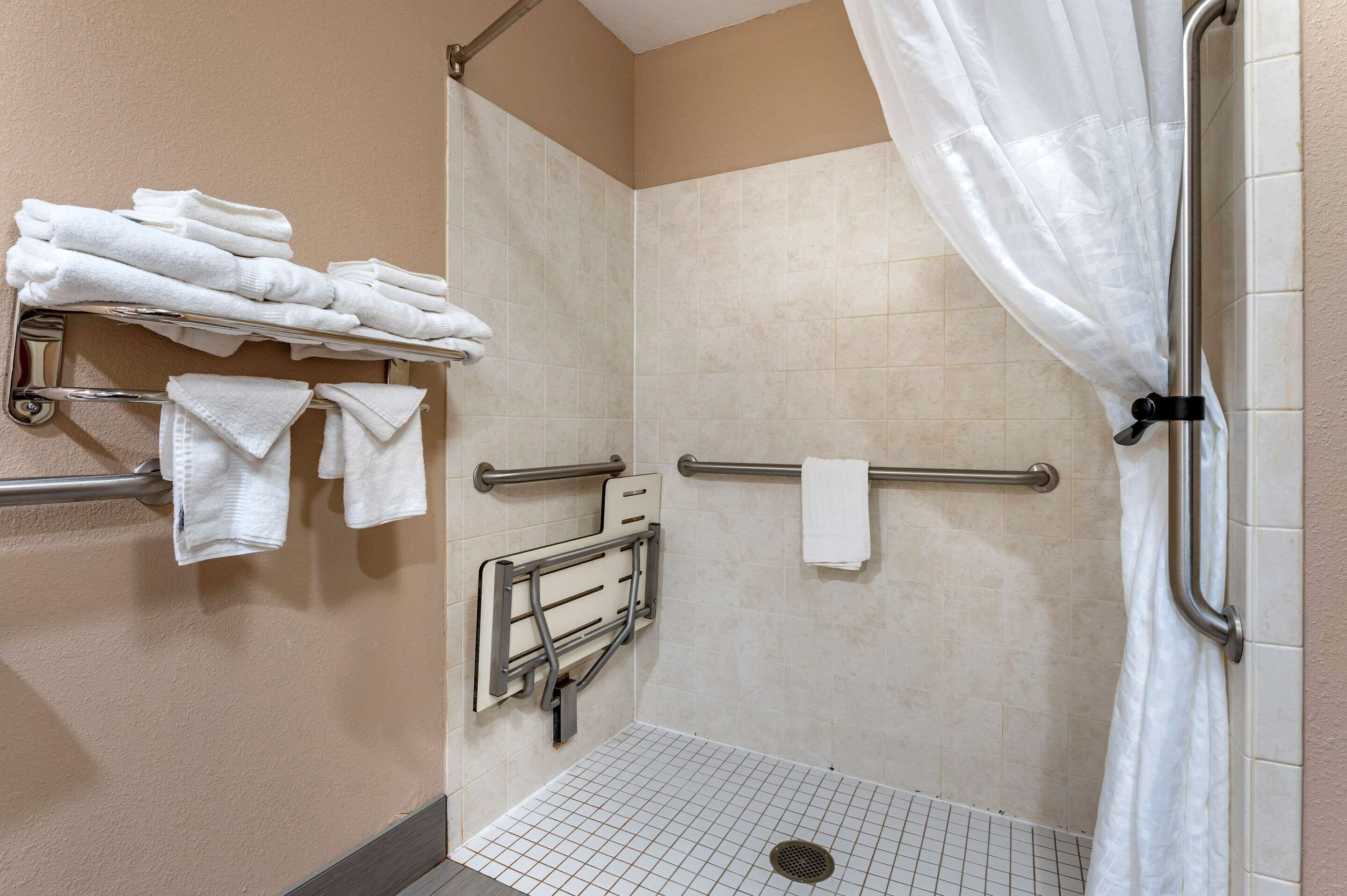 business room, 2 queen beds, accessible, non smoking | bathroom | combined shower/bathtub, free toiletries, hair dryer, towels