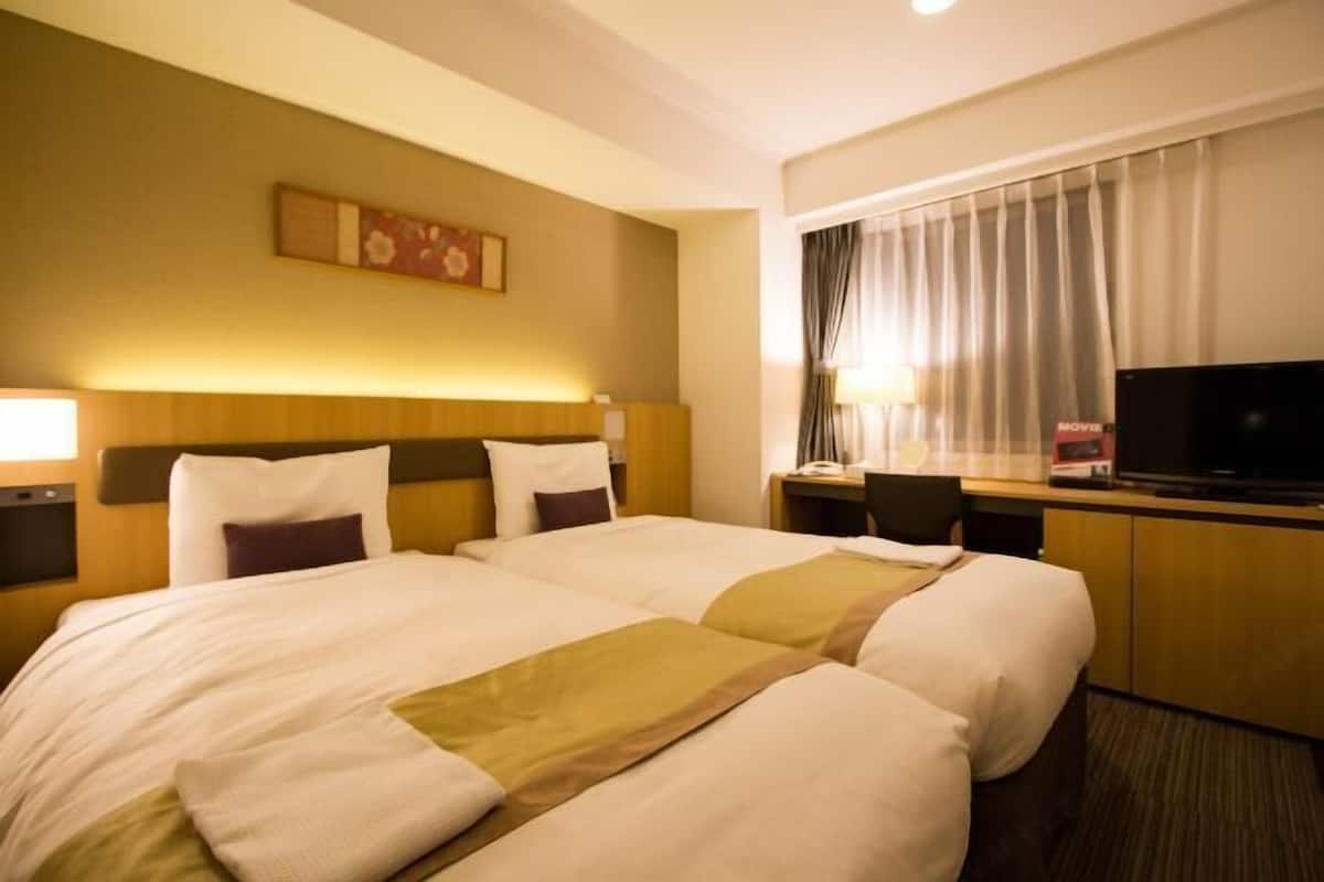 Desk, blackout curtains, free WiFi, bed sheets