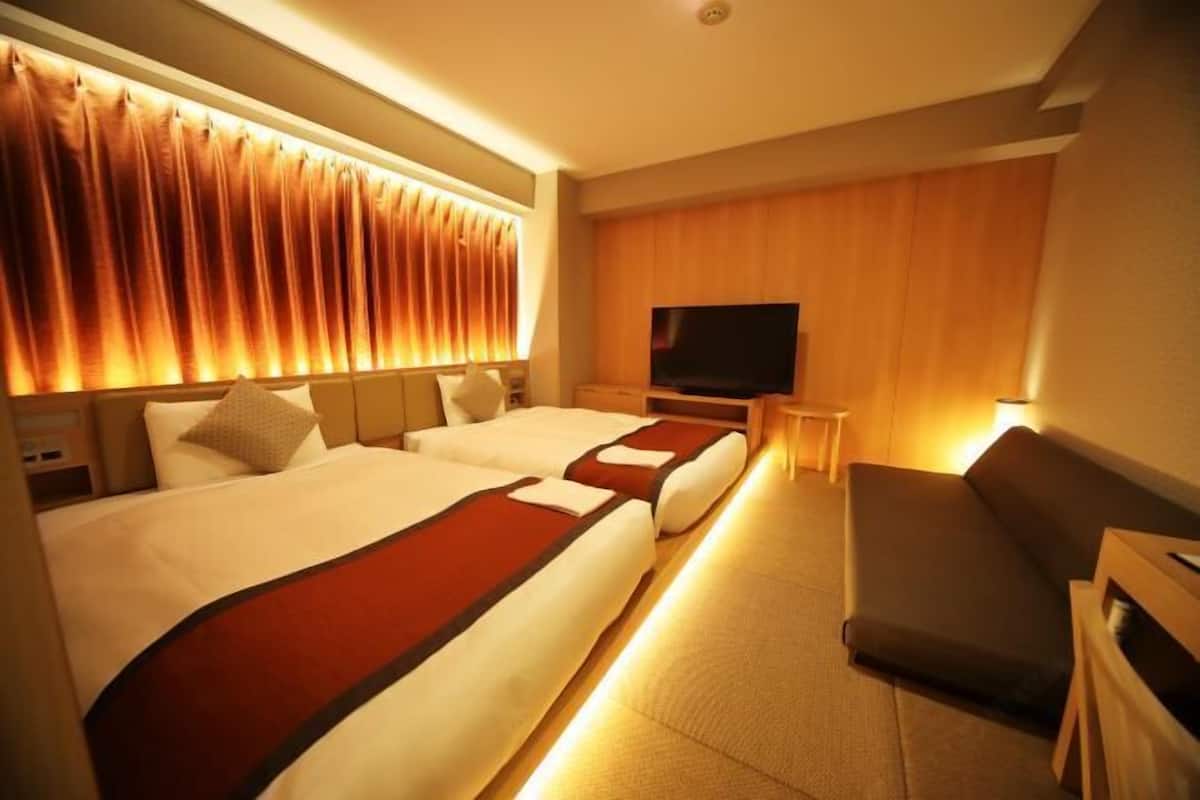 Desk, blackout curtains, free WiFi, bed sheets