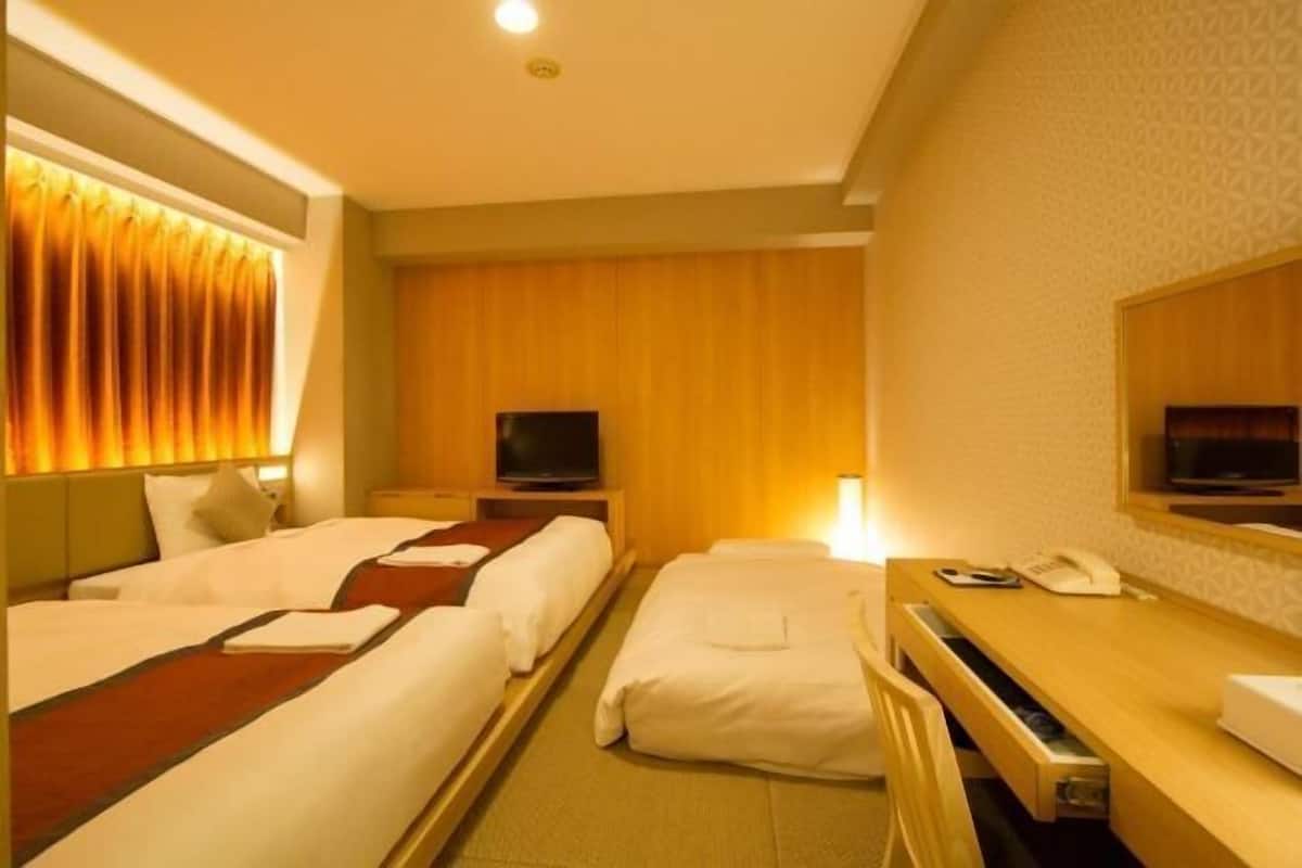 Desk, blackout curtains, free WiFi, bed sheets