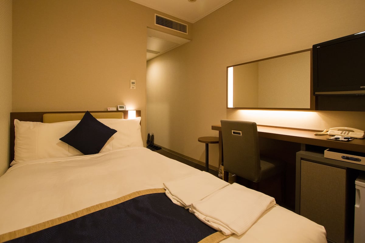 Desk, blackout curtains, free WiFi, bed sheets