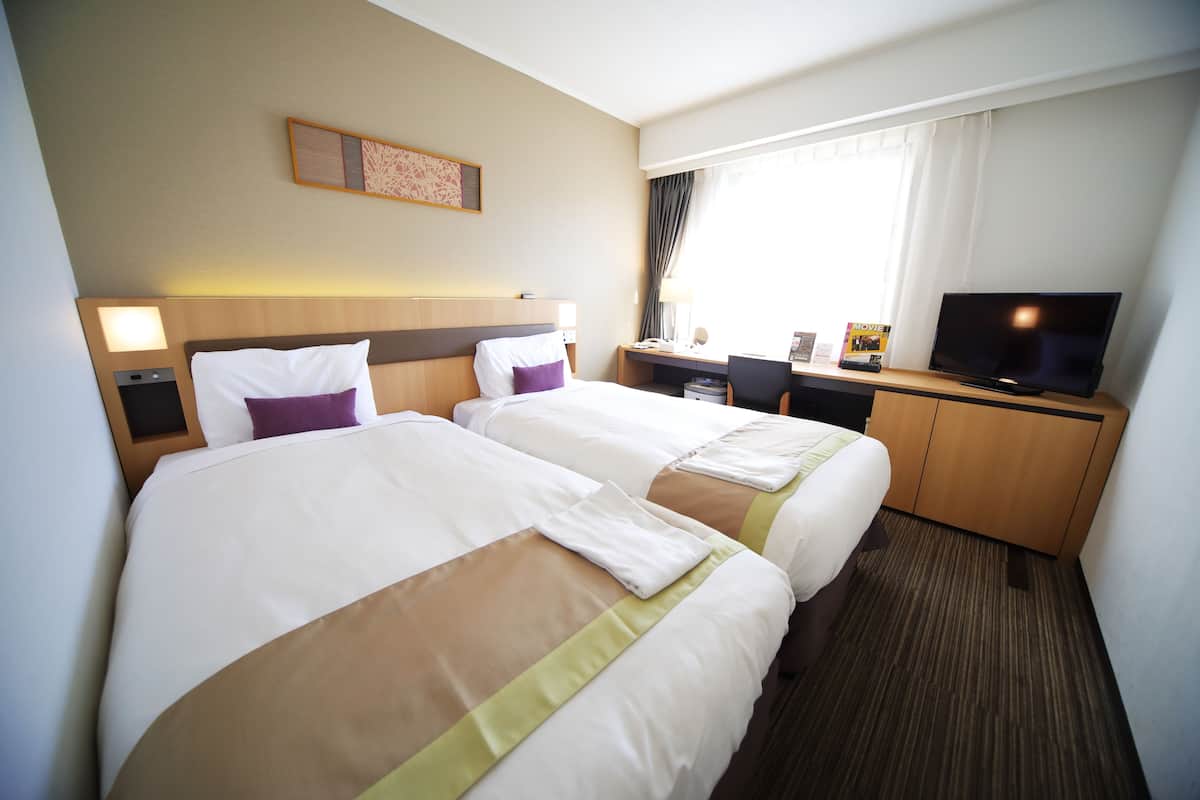 Desk, blackout curtains, free WiFi, bed sheets