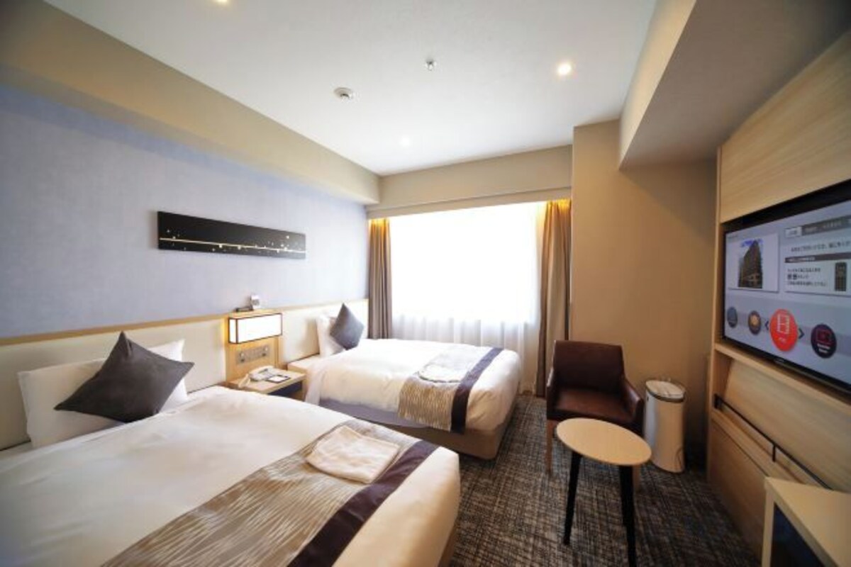 Desk, blackout curtains, free WiFi, bed sheets