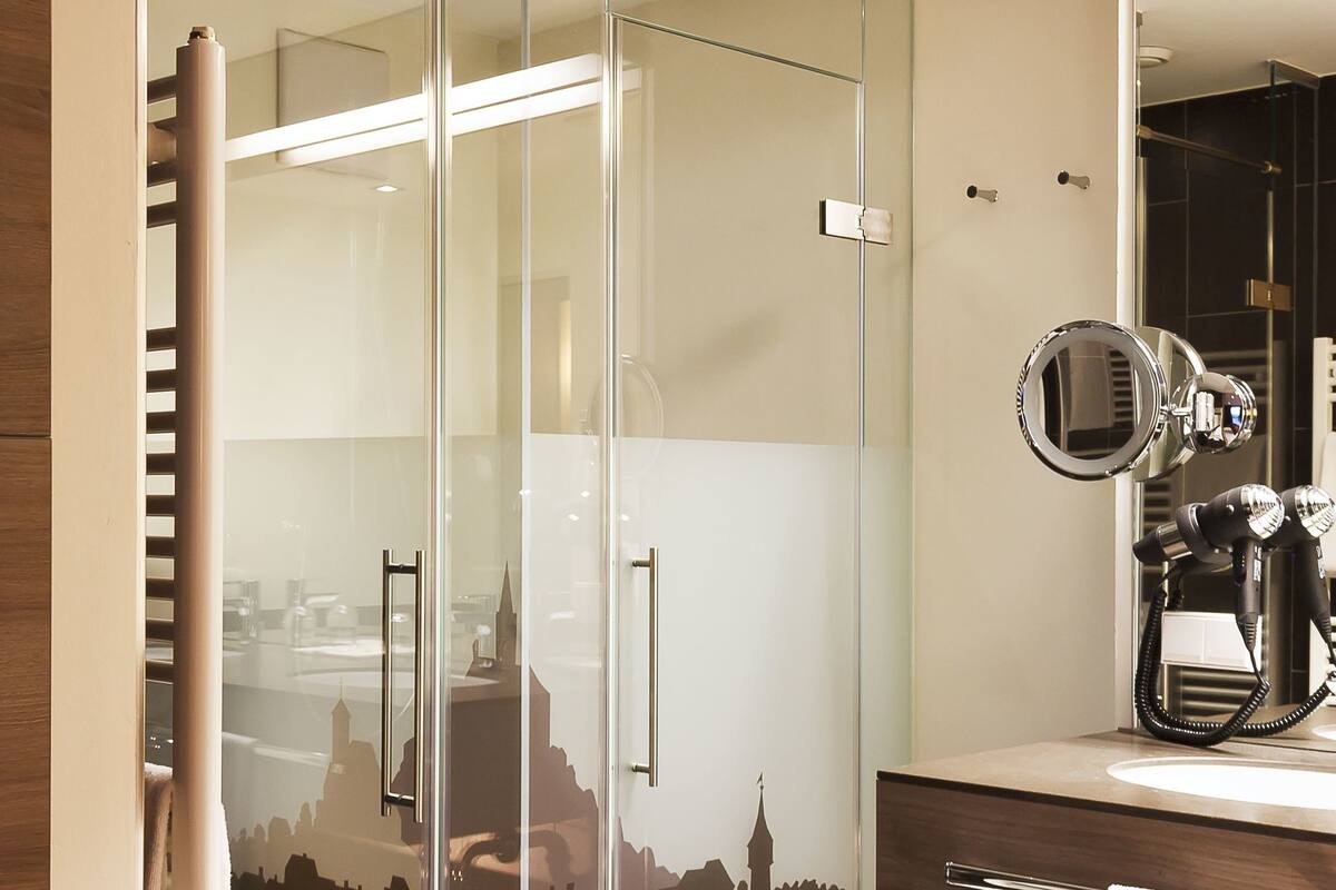 suite | bathroom | shower, hair dryer, bathrobes, towels