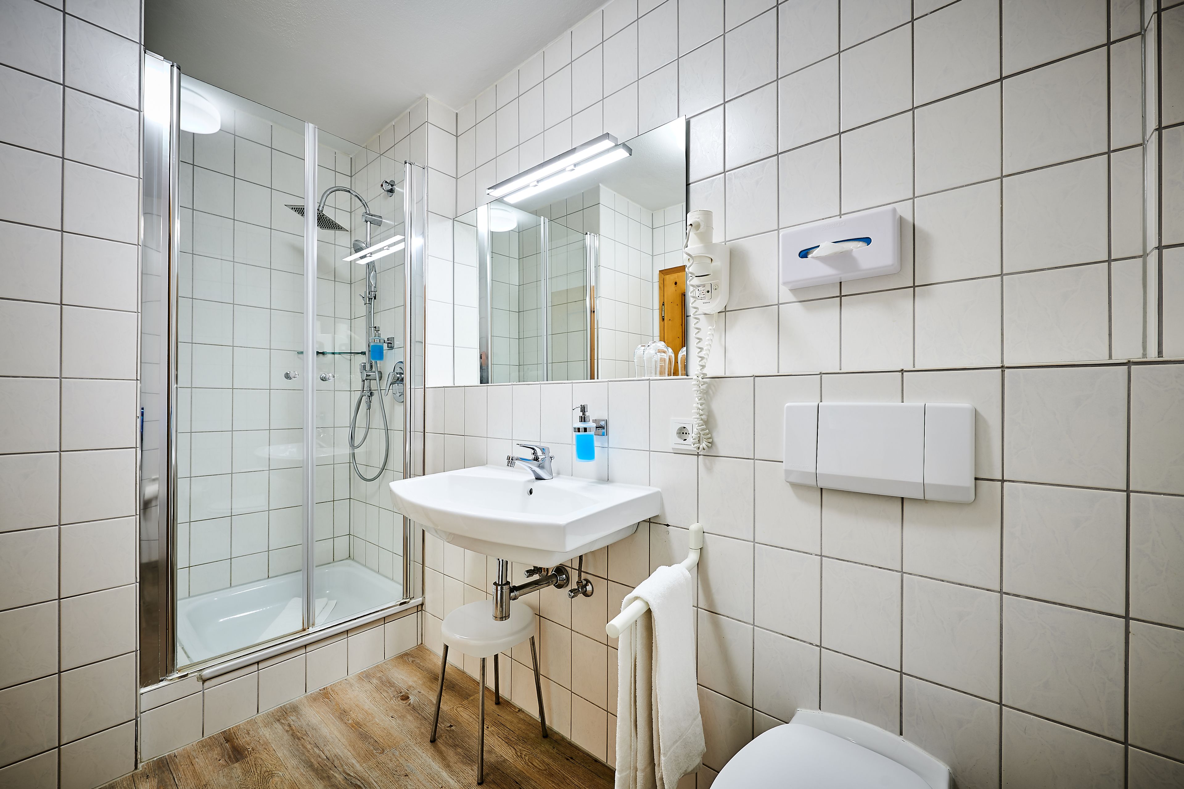 shower, hair dryer, bathrobes, towels