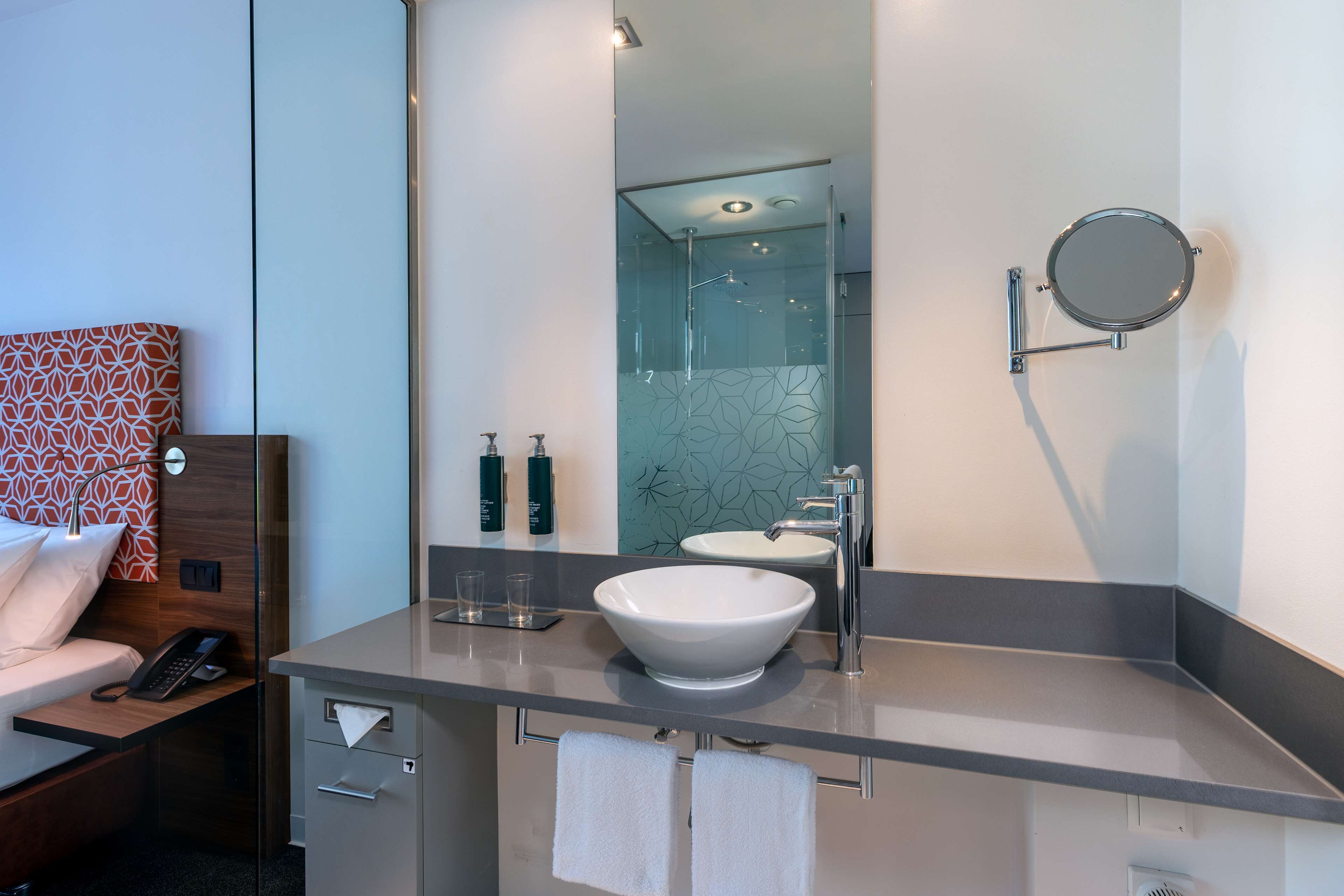 combined shower/bathtub, free toiletries, hair dryer, slippers