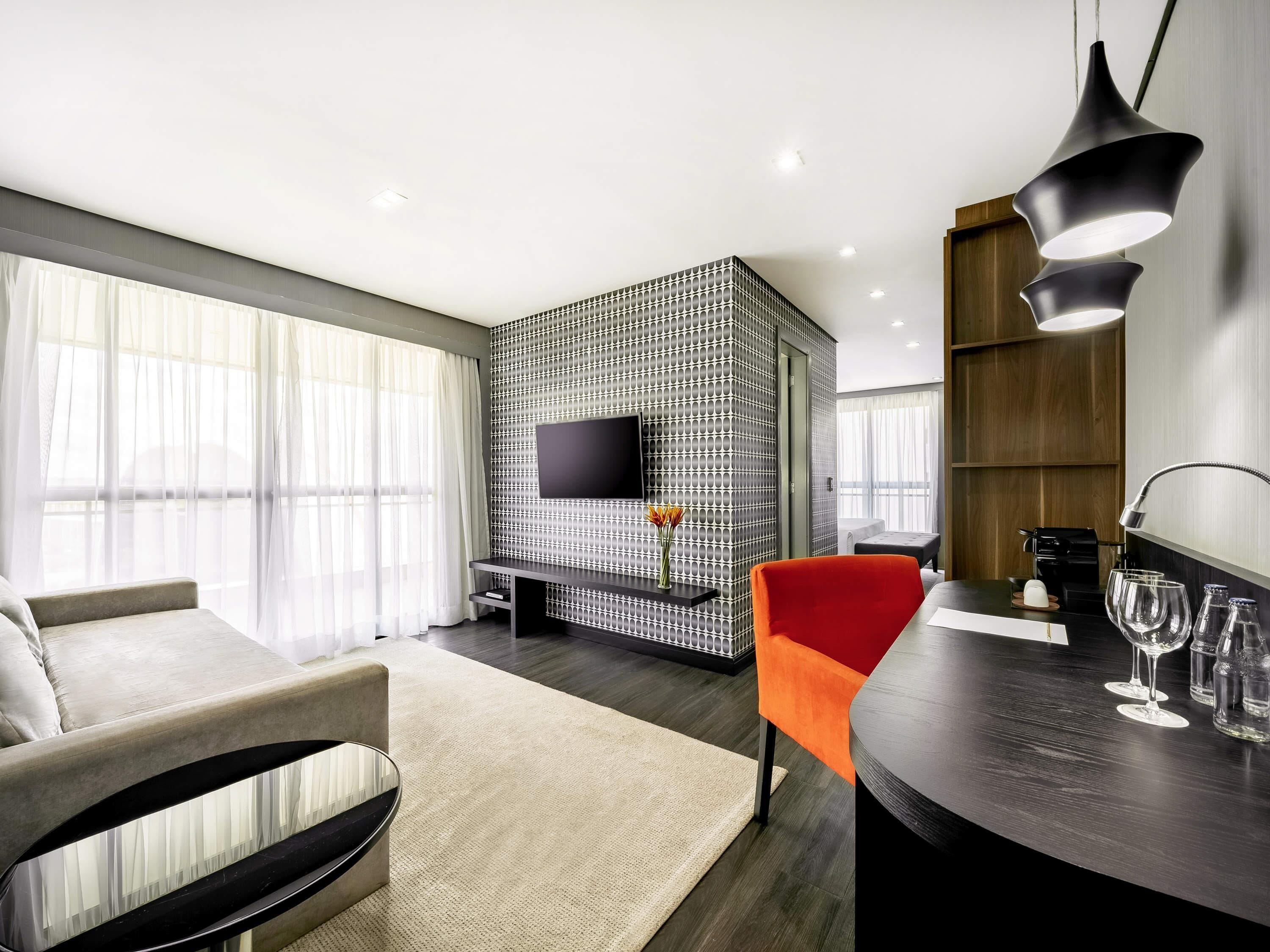 Suíte executiva, 1 cama King e sofá-cama | Roupas de cama premium, frigobar, cofres nos quartos, escrivaninha