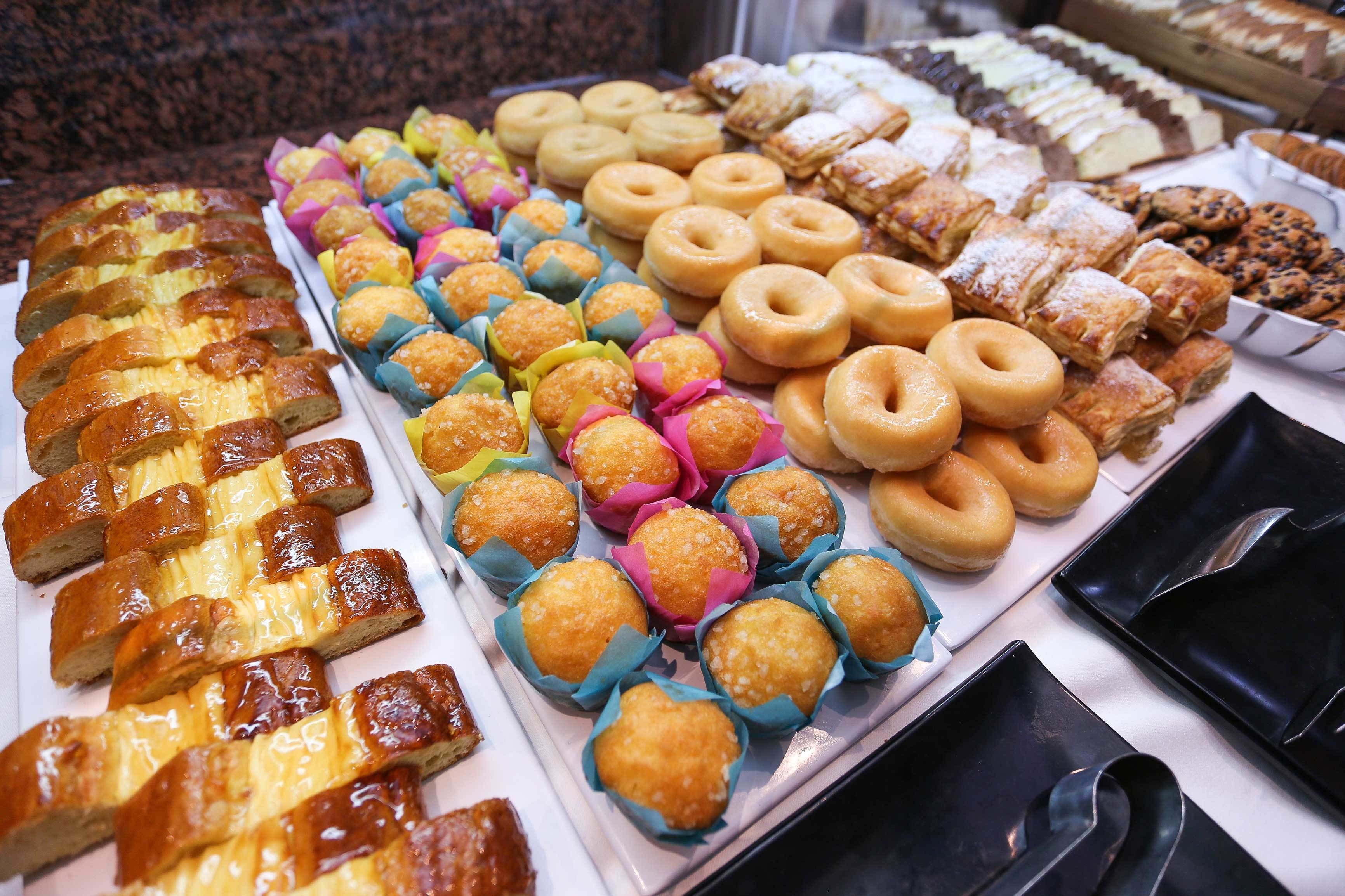A display of various pastries and baked goods.