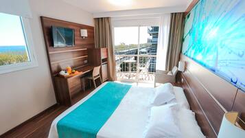 Deluxe Double Room, Sea View | Premium bedding, minibar, in-room safe, desk