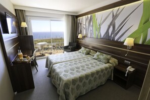 Ropa de cama de alta calidad, minibar, caja fuerte y escritorio