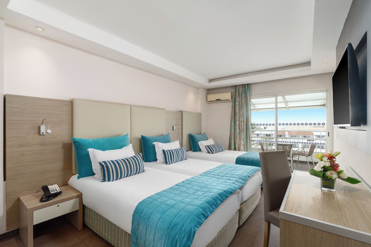 Superior Triple Room, Pool View | 1 bedroom, premium bedding, minibar, in-room safe